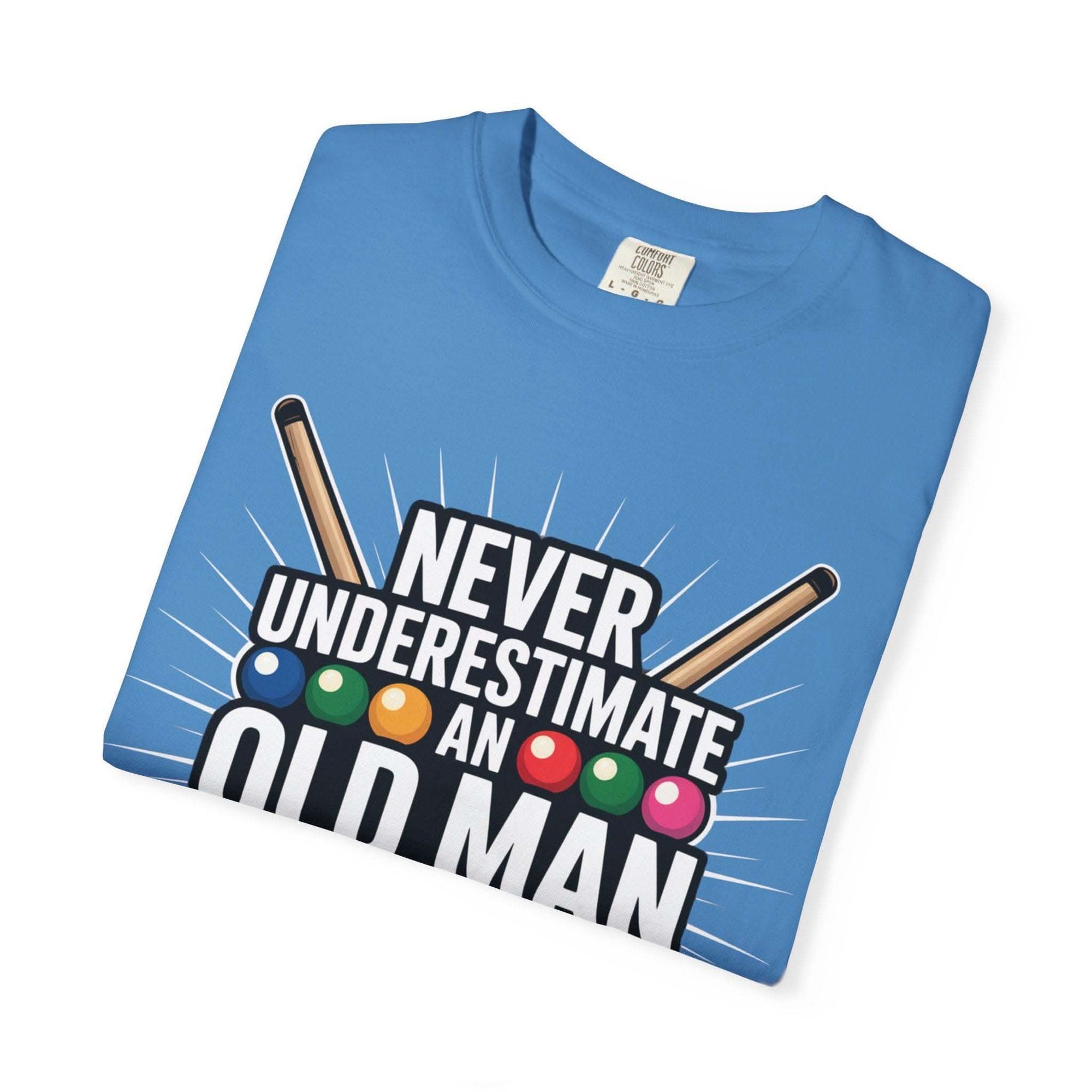 Blue t-shirt with "Never Underestimate An Old Man" text and pool cue graphic design