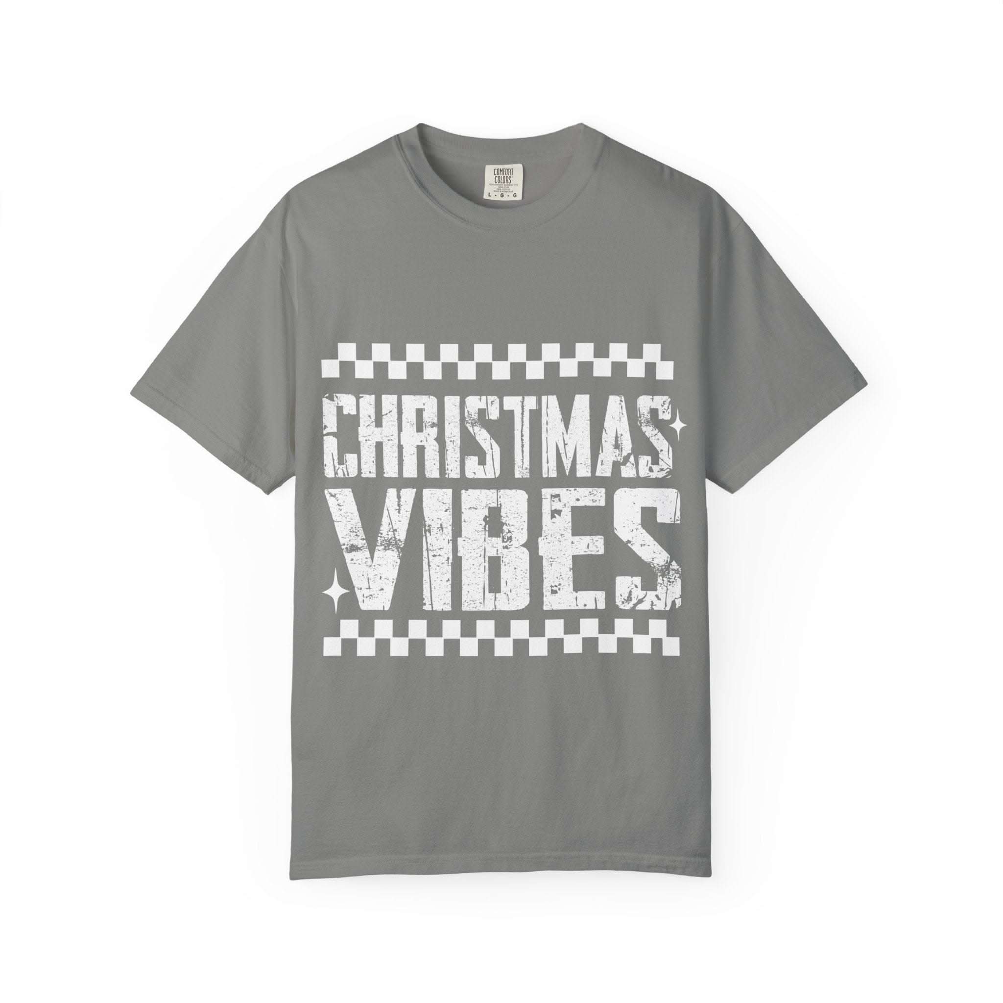 Vintage distressed Christmas vibes t-shirt in soft, faded holiday colors with worn-in charm