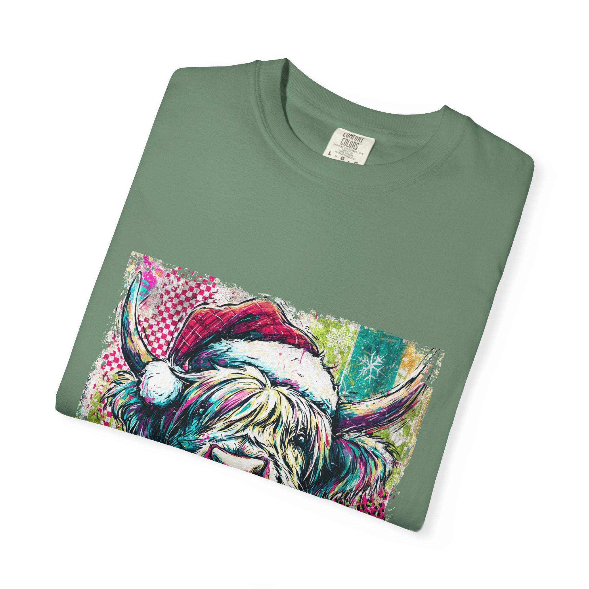 Retro Santa Highland Cow graphic on green cotton T-shirt