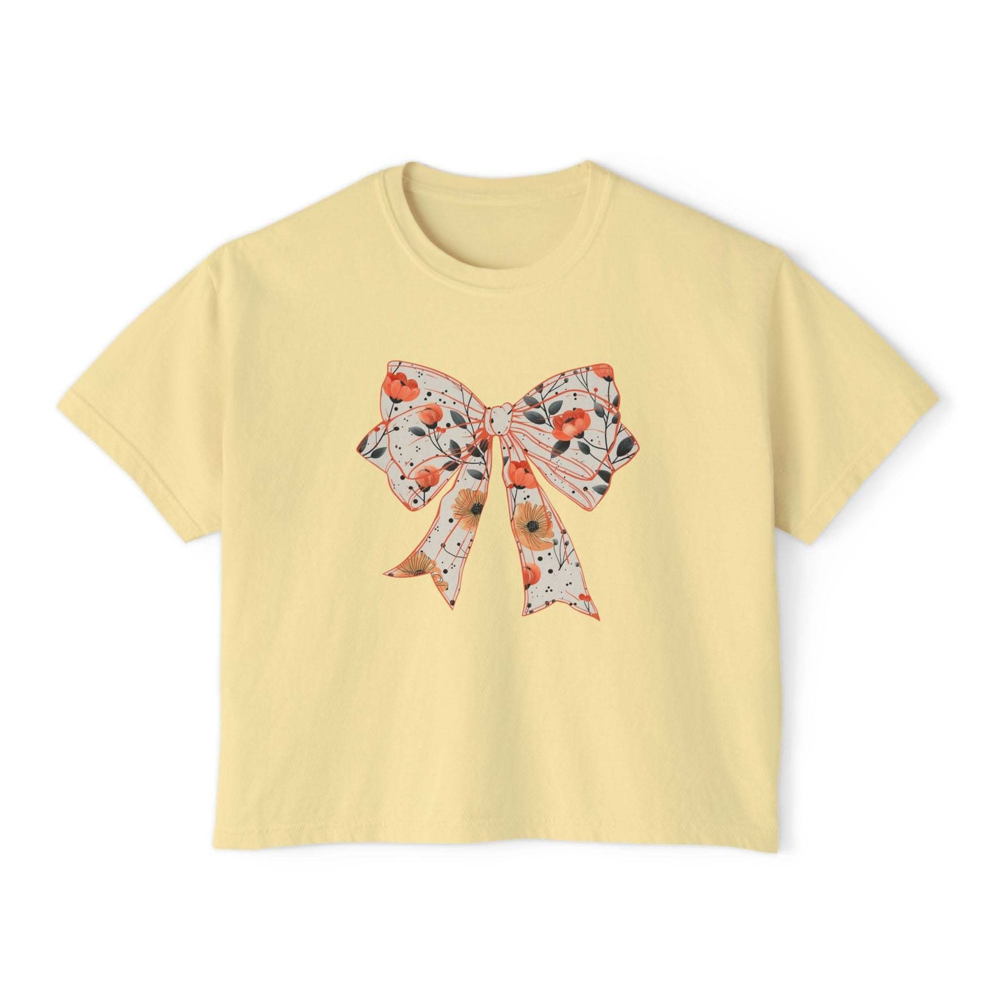 Floral coquette bow design womens tee in butter color, boxy fit, vintage cotton