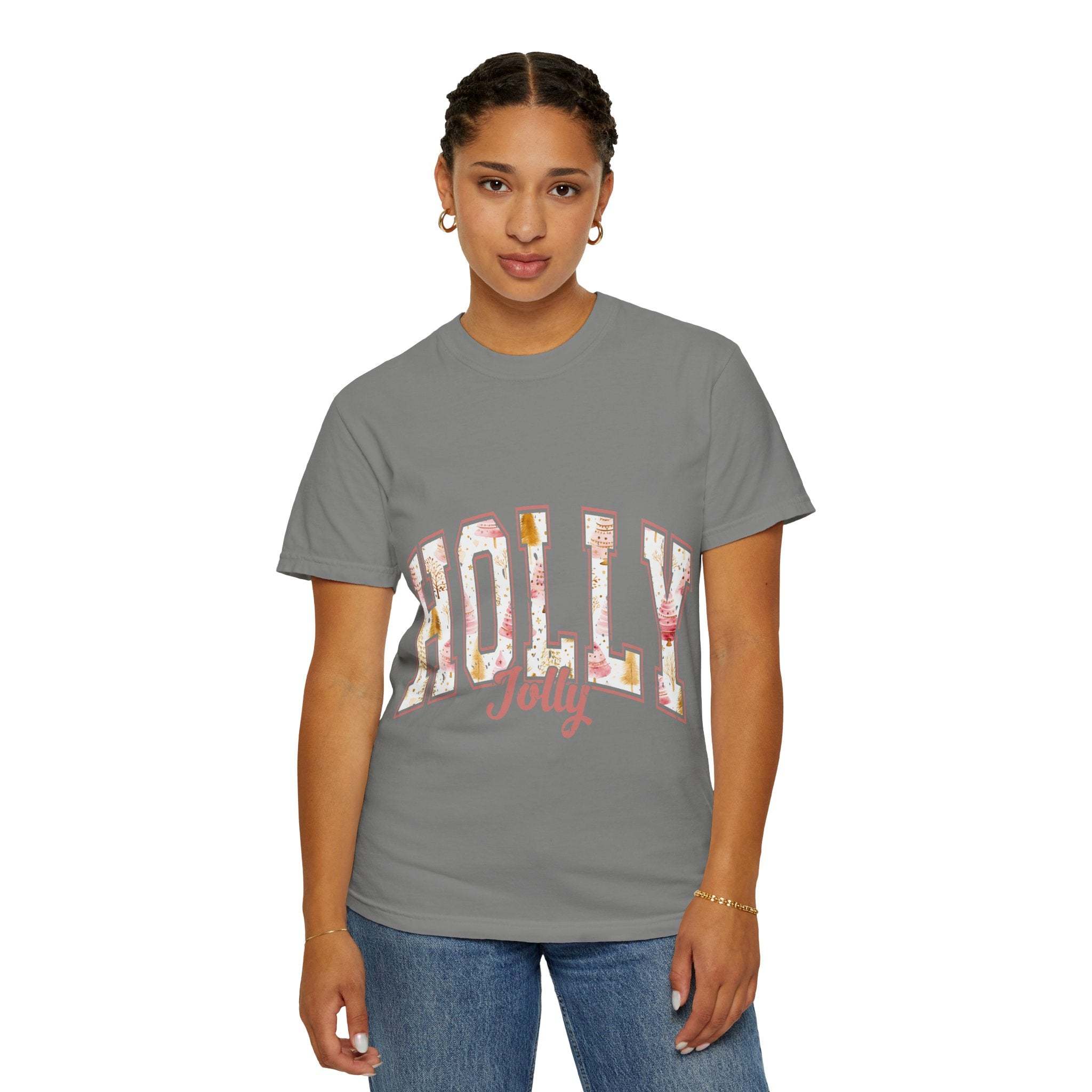 Woman wearing gray Varsity Holly Jolly T-shirt with festive print and jeans
