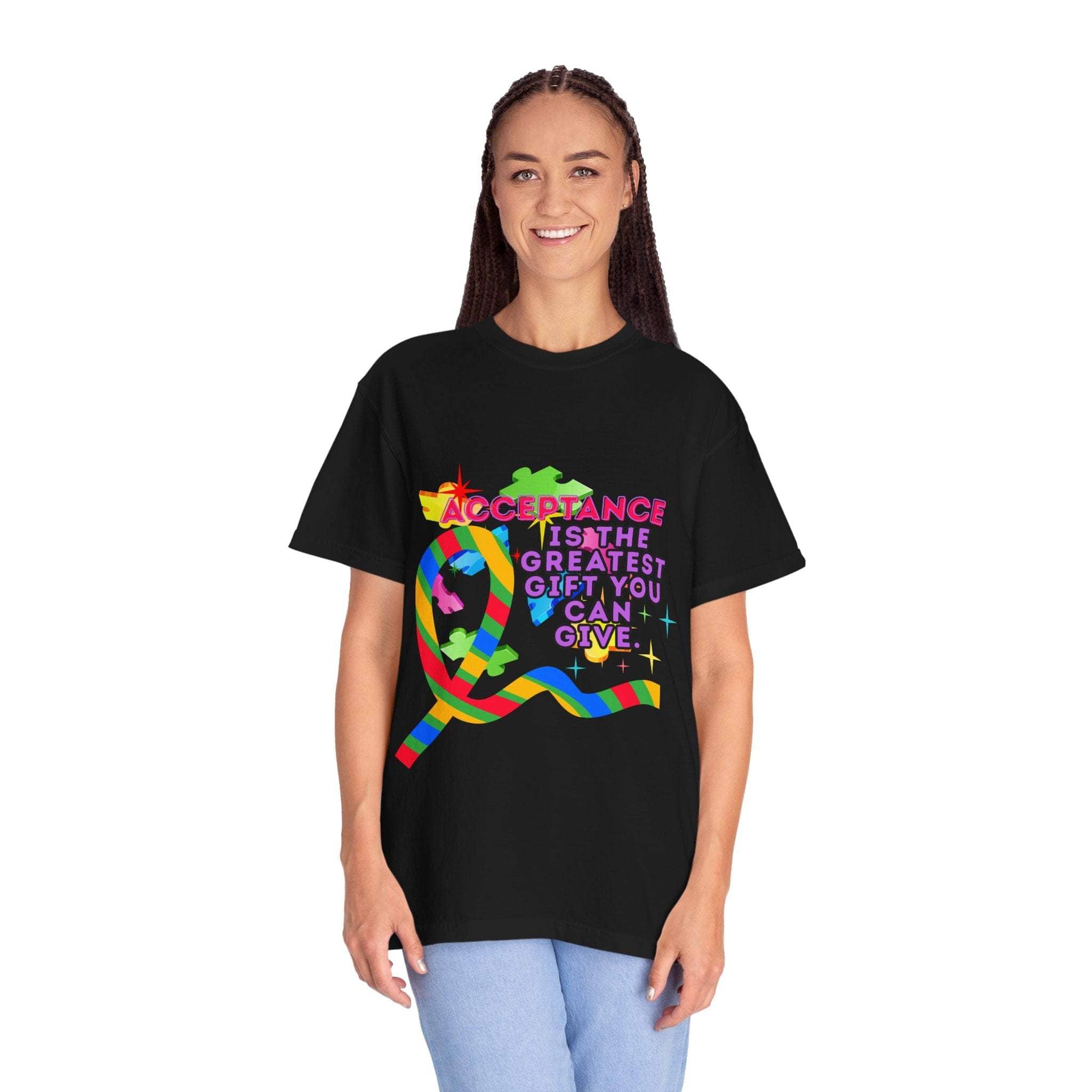 Garment-dyed black T-shirt with colorful autism acceptance ribbon and message worn by smiling woman