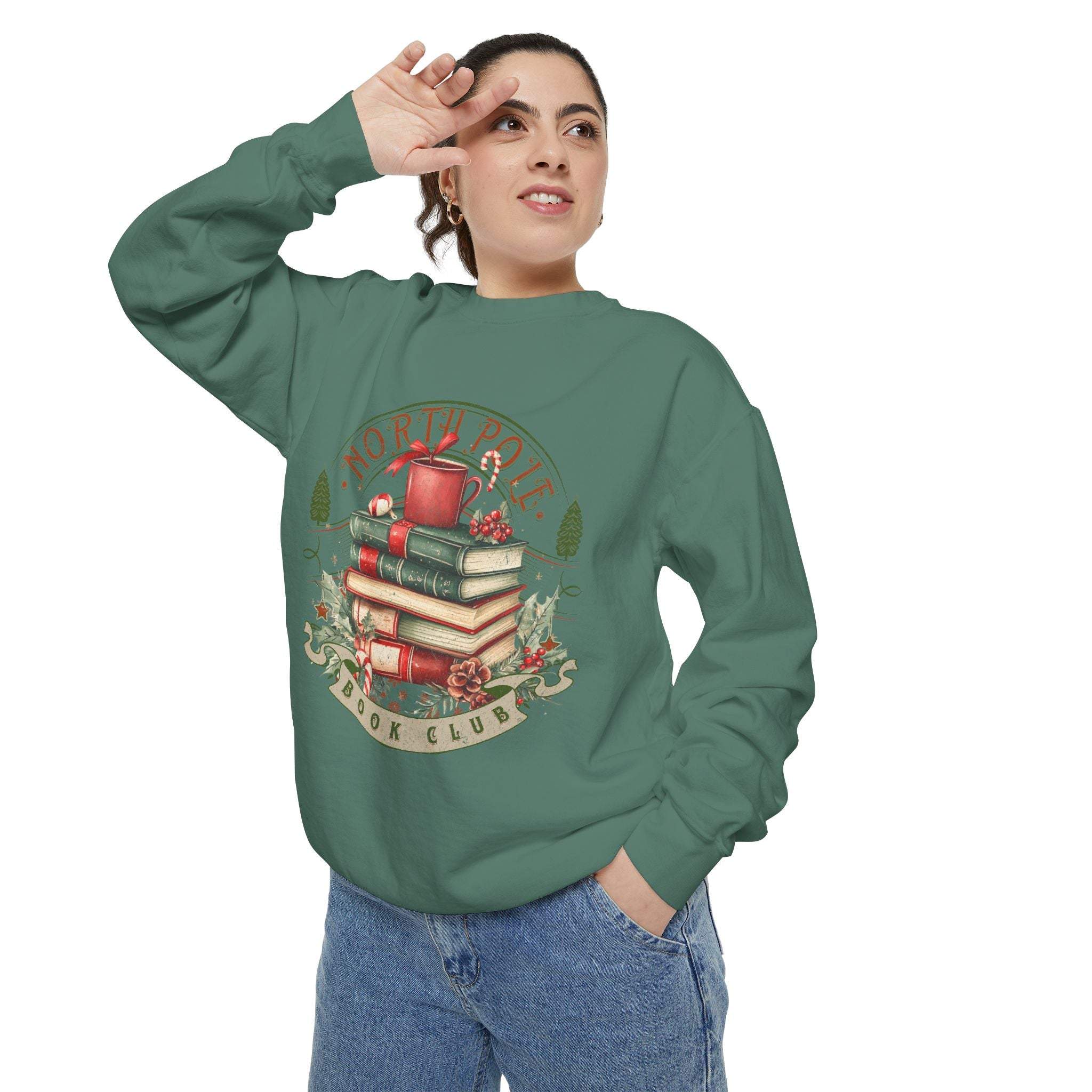 Woman wearing vintage North Pole Book Club green sweatshirt with book and holiday design
