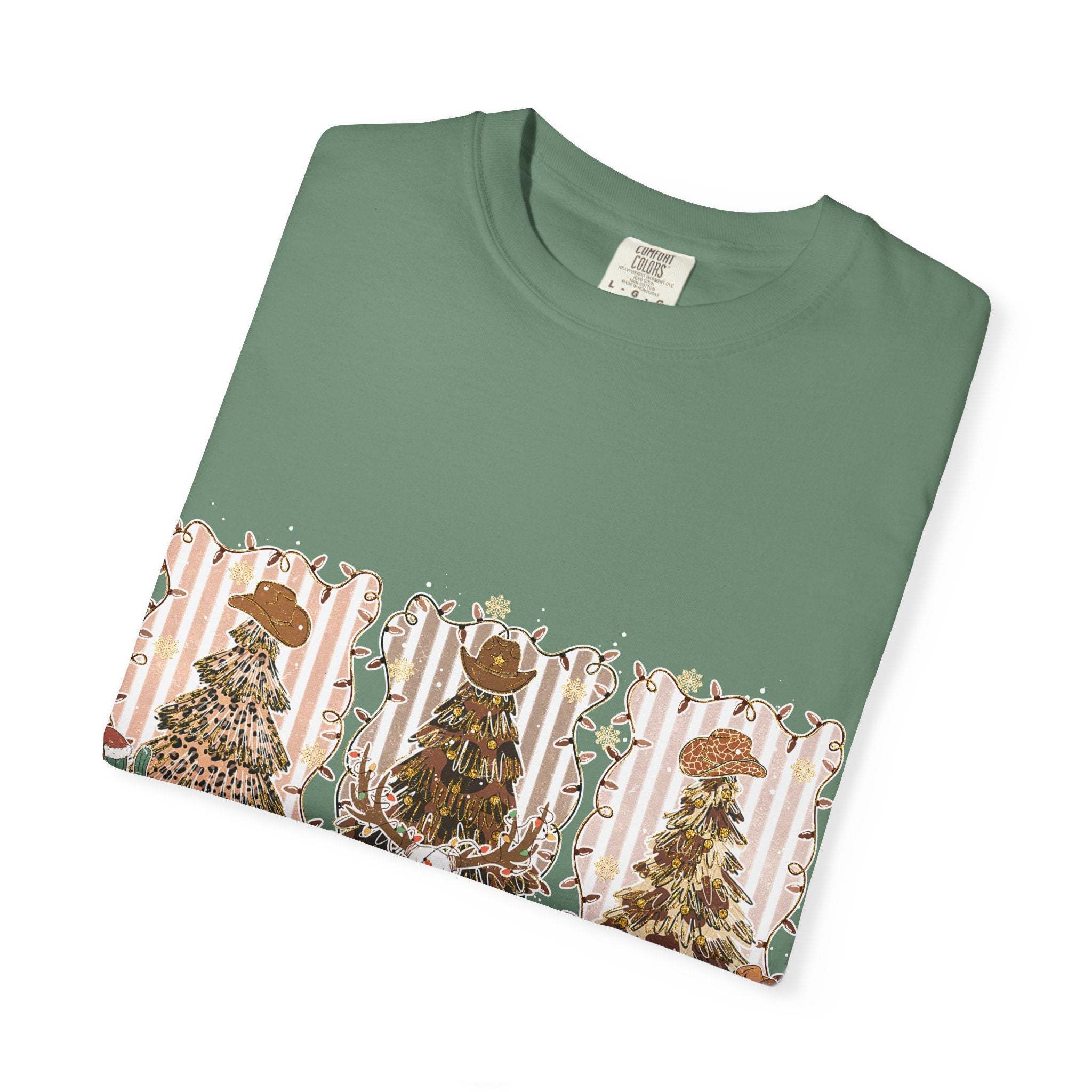 Cowboy Howdy Christmas t-shirt with festive cowboy trees design on green cotton fabric