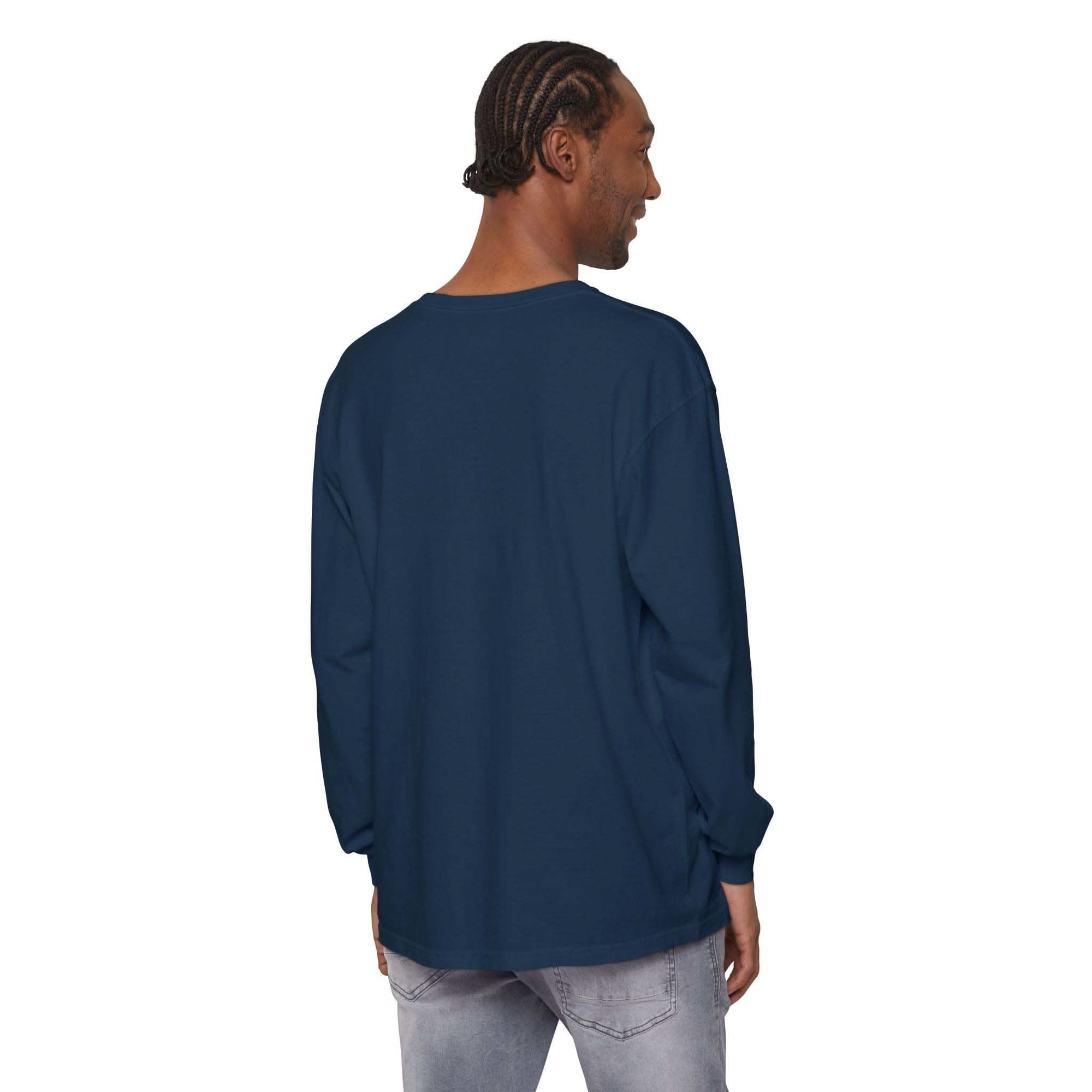 Back view of man wearing navy long sleeve t-shirt with ribbed cuffs and durable hems