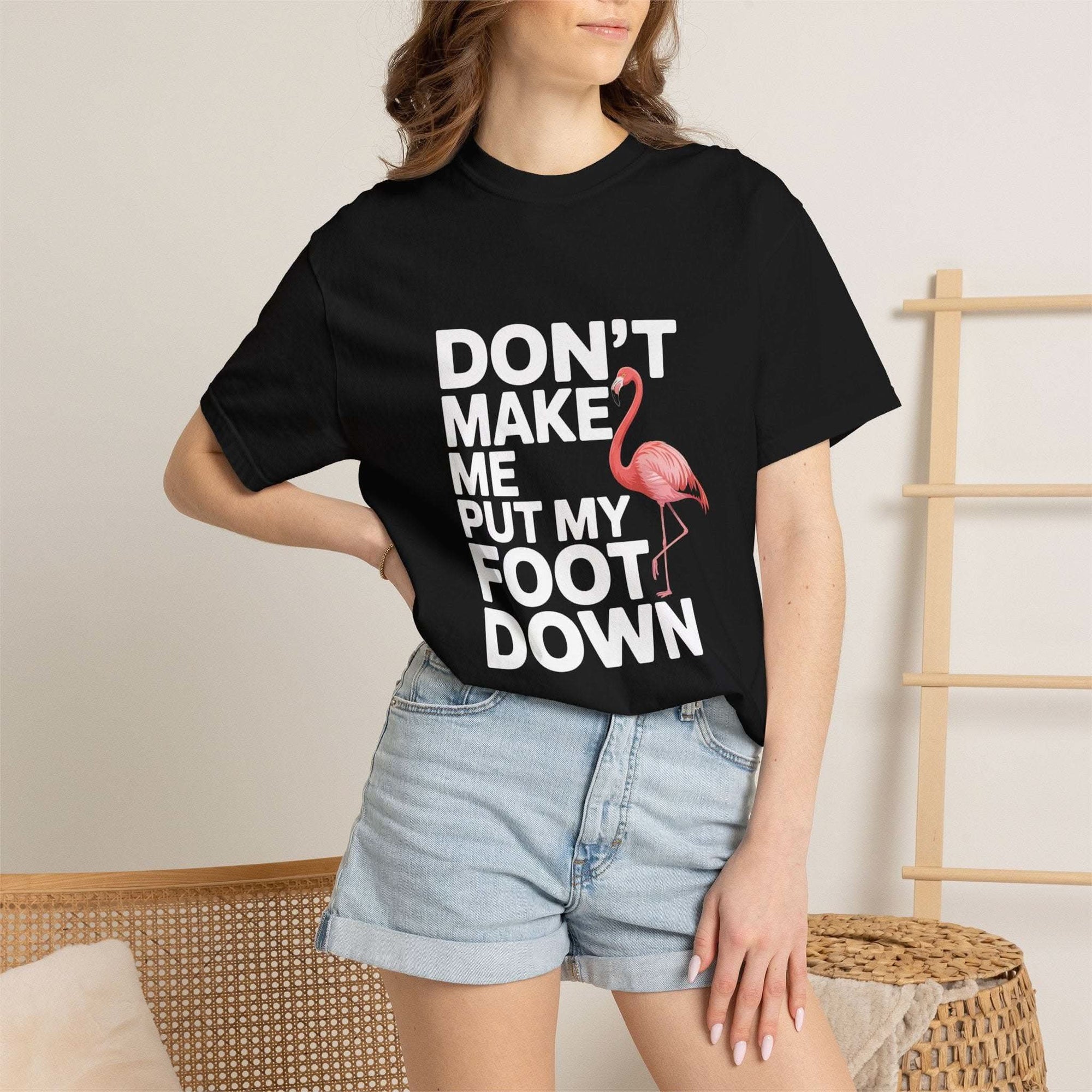 Dont Make Me Put My Foot Down flamingo graphic T-shirt with bold white text on vintage garment-dyed cotton