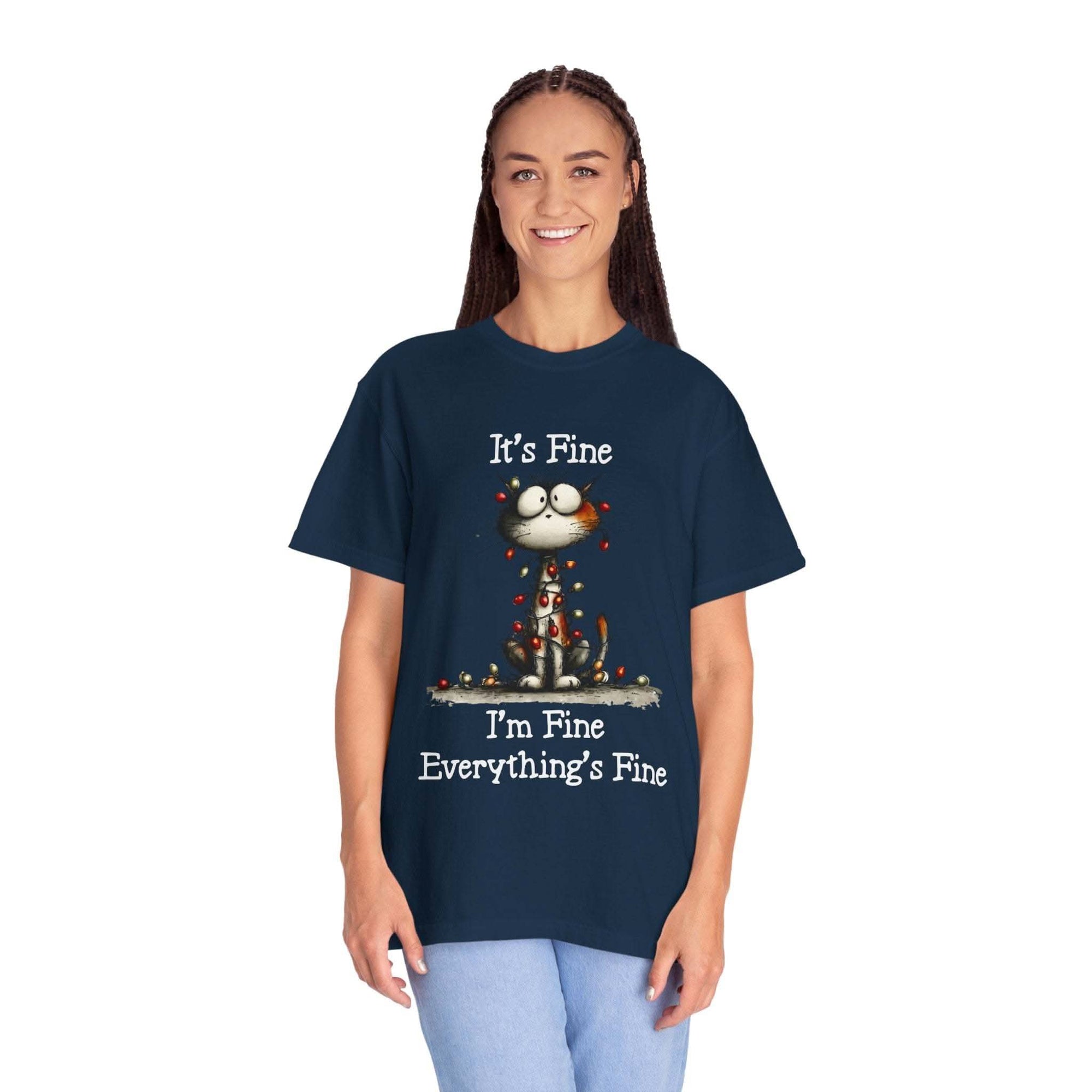 Woman wearing navy cat t-shirt with "It's Fine I'm Fine Everything's Fine" text and cat illustration
