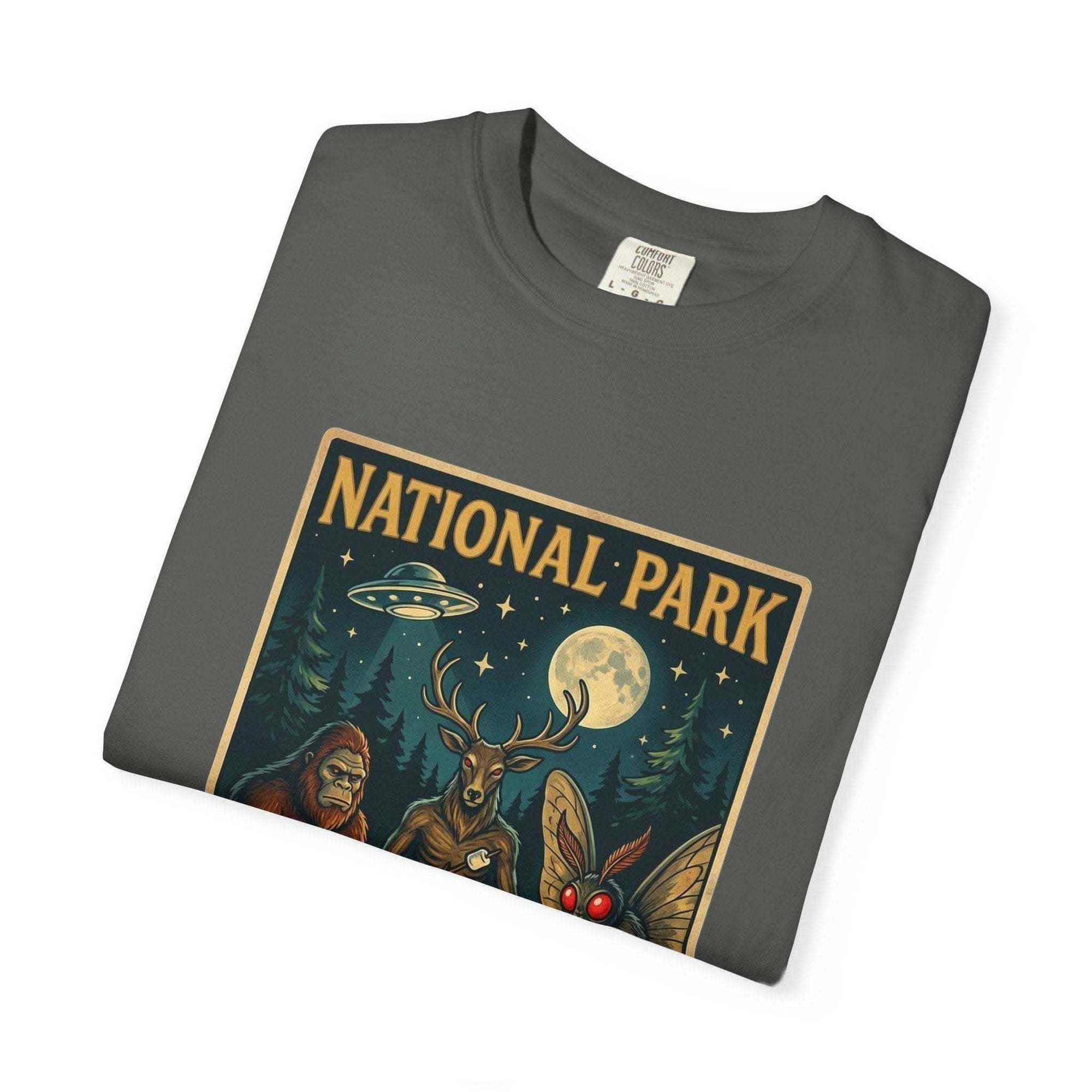 Vintage National Park After Dark T-shirt with campfire, Sasquatch, and Mothman night creatures design