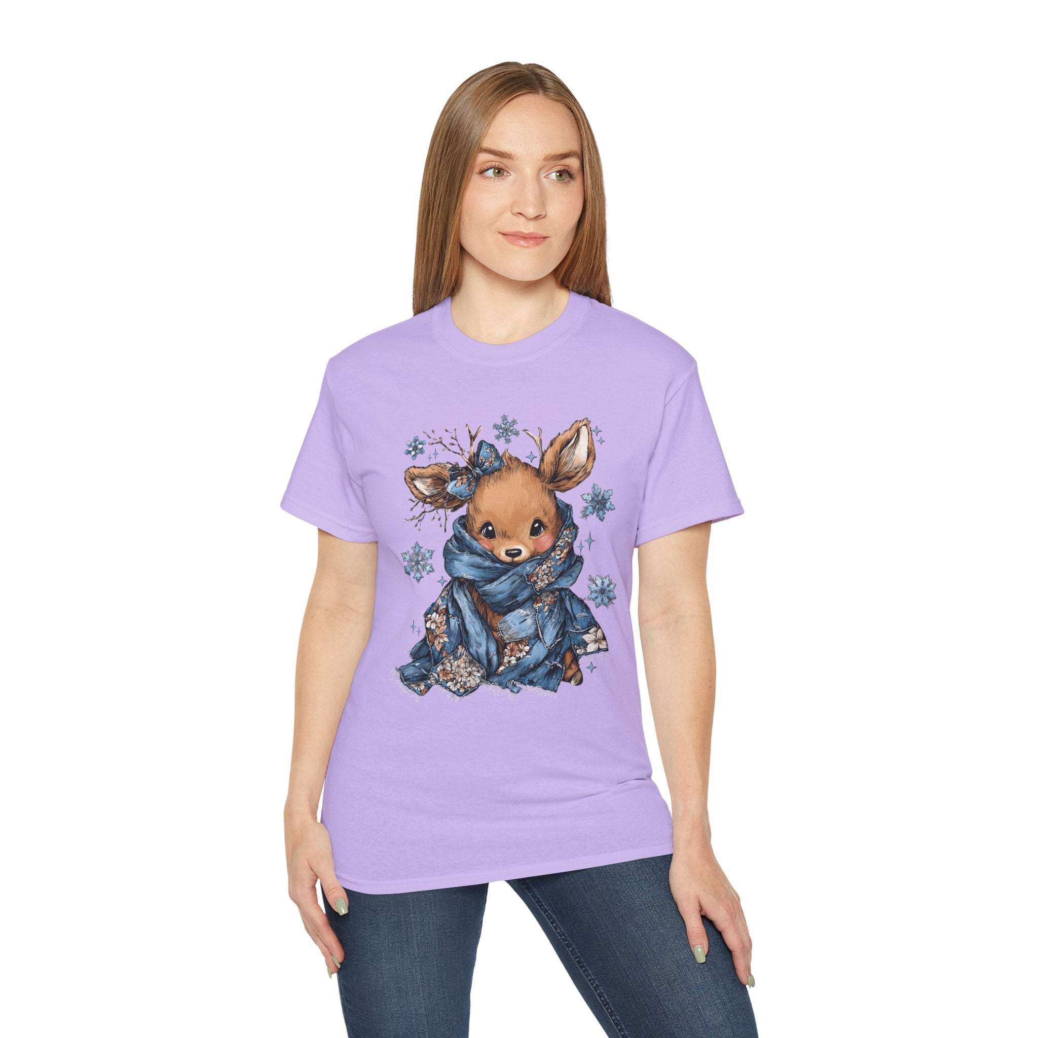 White t-shirt with retro patchwork reindeer design wearing blue scarf and surrounded by snowflakes