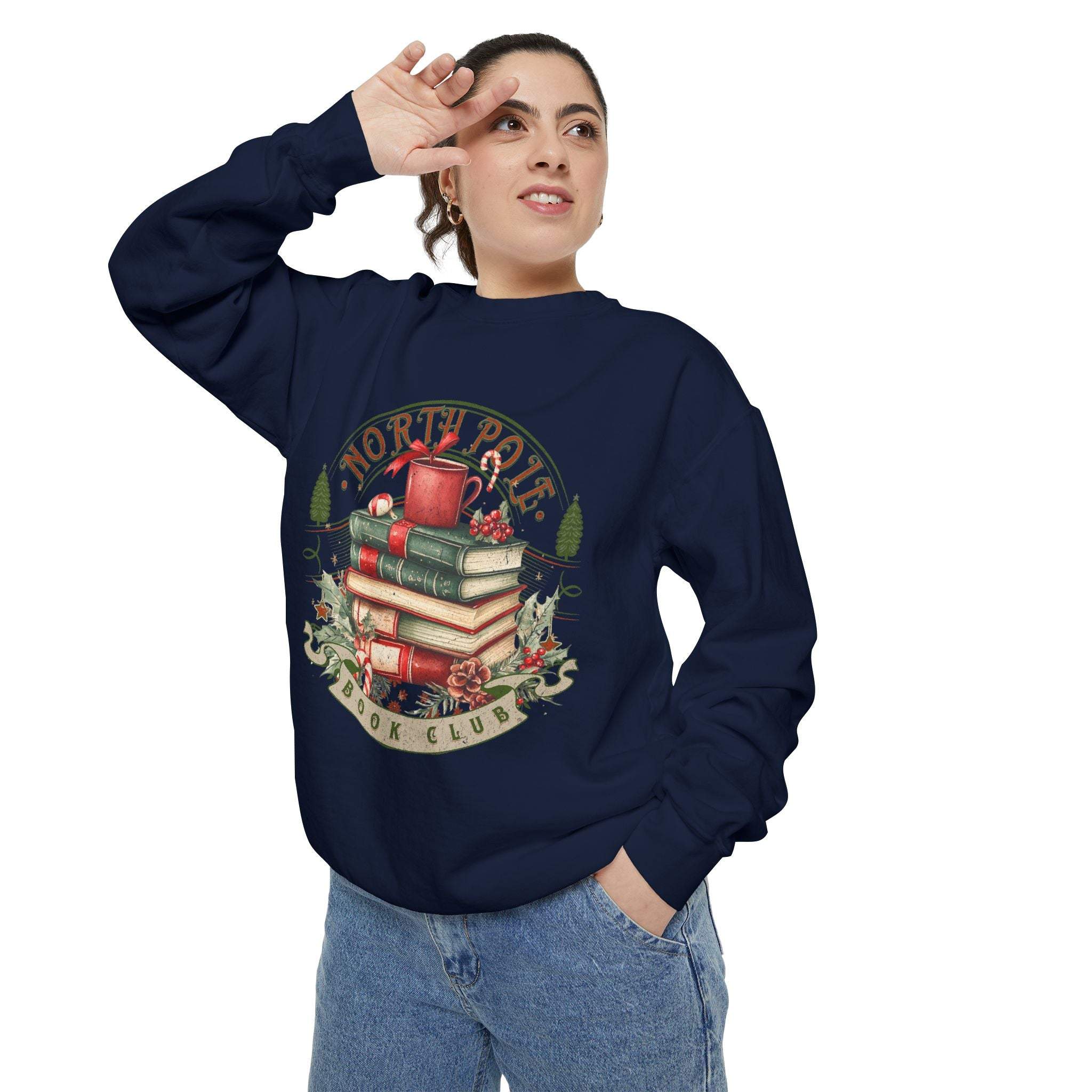 Woman wearing navy Vintage North Pole Book Club sweatshirt with holiday book stack design