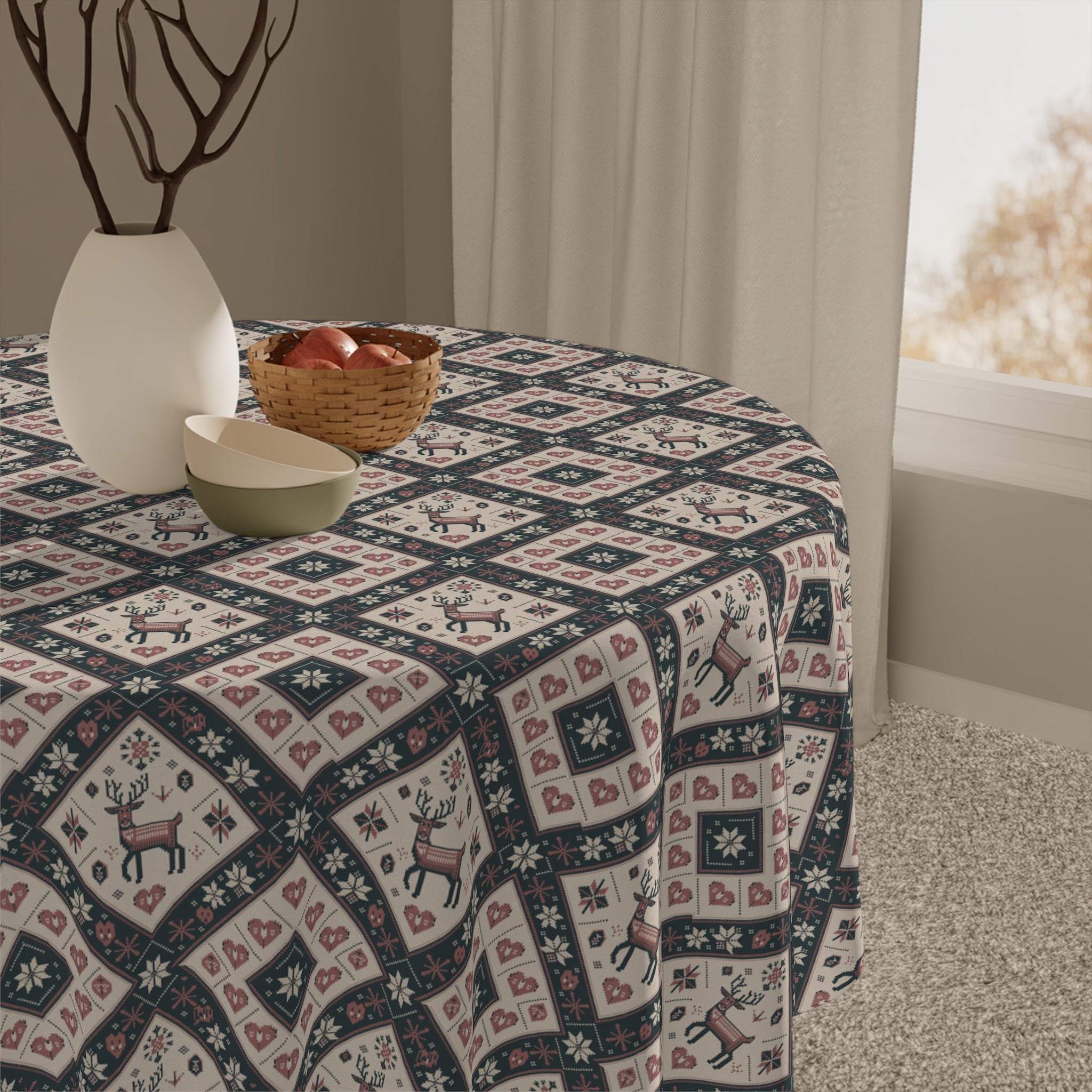 Winter Nordic Scandinavian tablecloth with reindeer and heart pattern on round table in cozy room