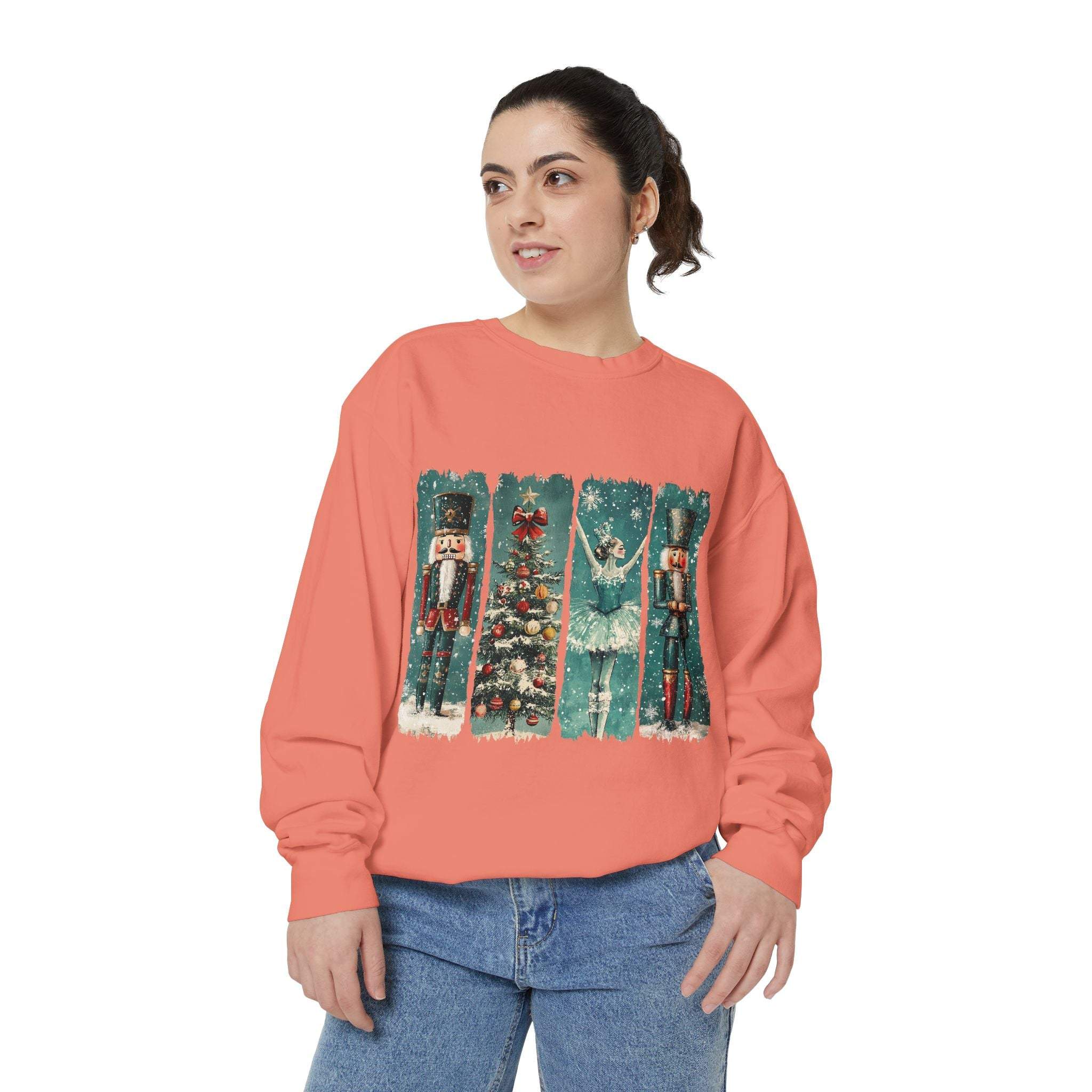 Woman wearing a vintage Christmas nutcracker sweatshirt with watercolor nutcracker and Christmas tree design