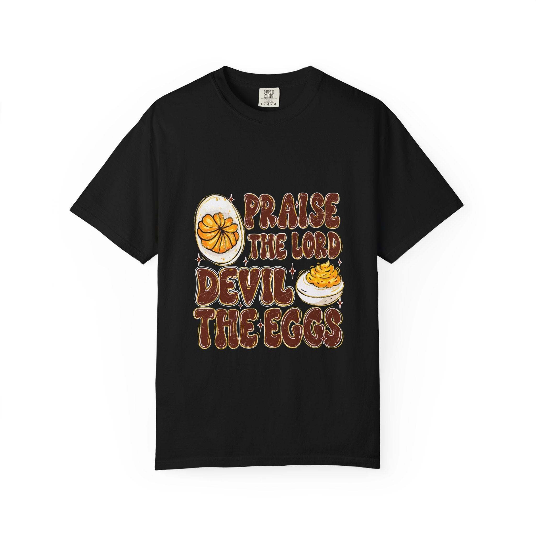 White cotton t-shirt featuring 'Praise the Lord, Devil the Eggs' design, perfect for Easter and Christian apparel.