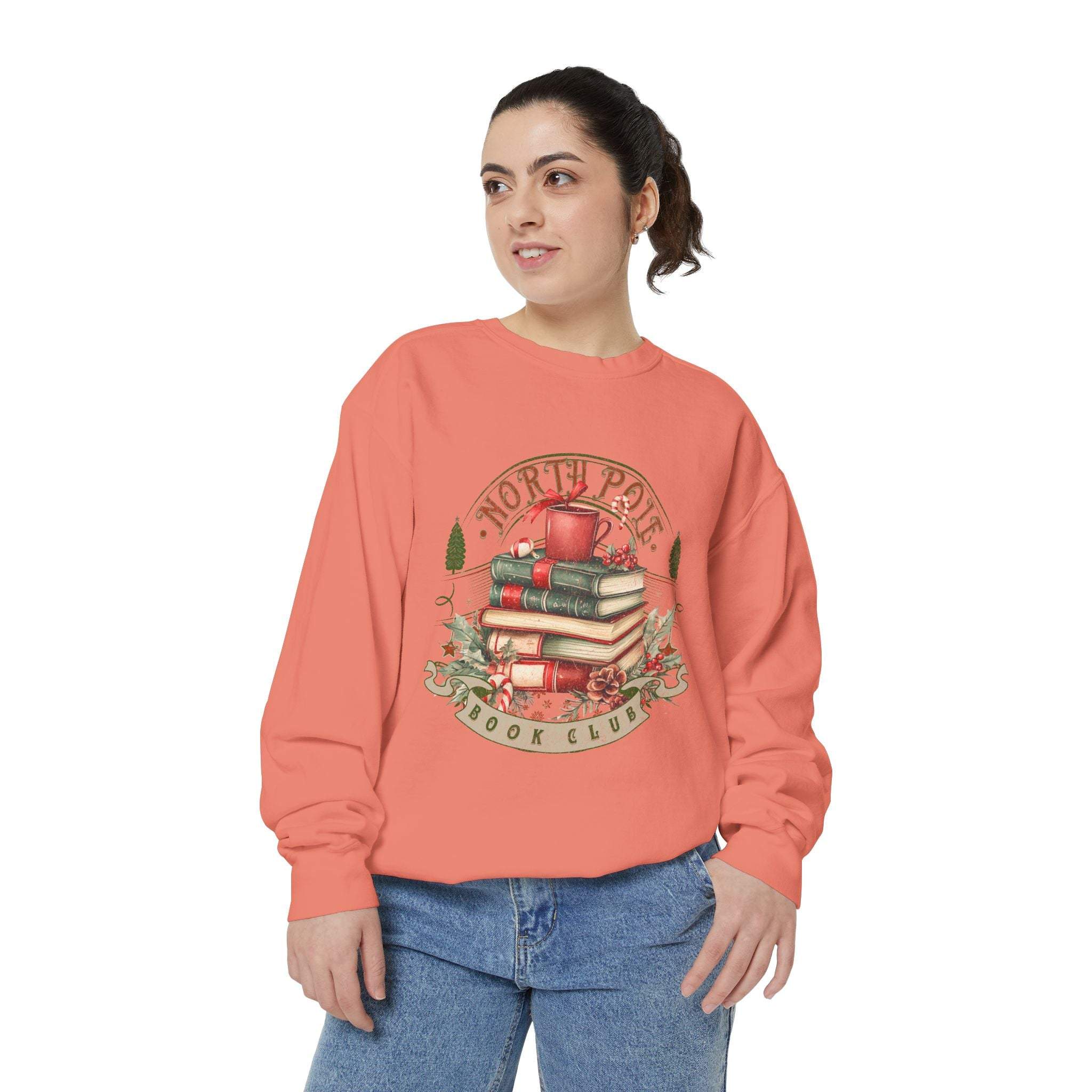 Woman wearing Vintage North Pole Book Club sweatshirt with book stack graphic and cozy fit