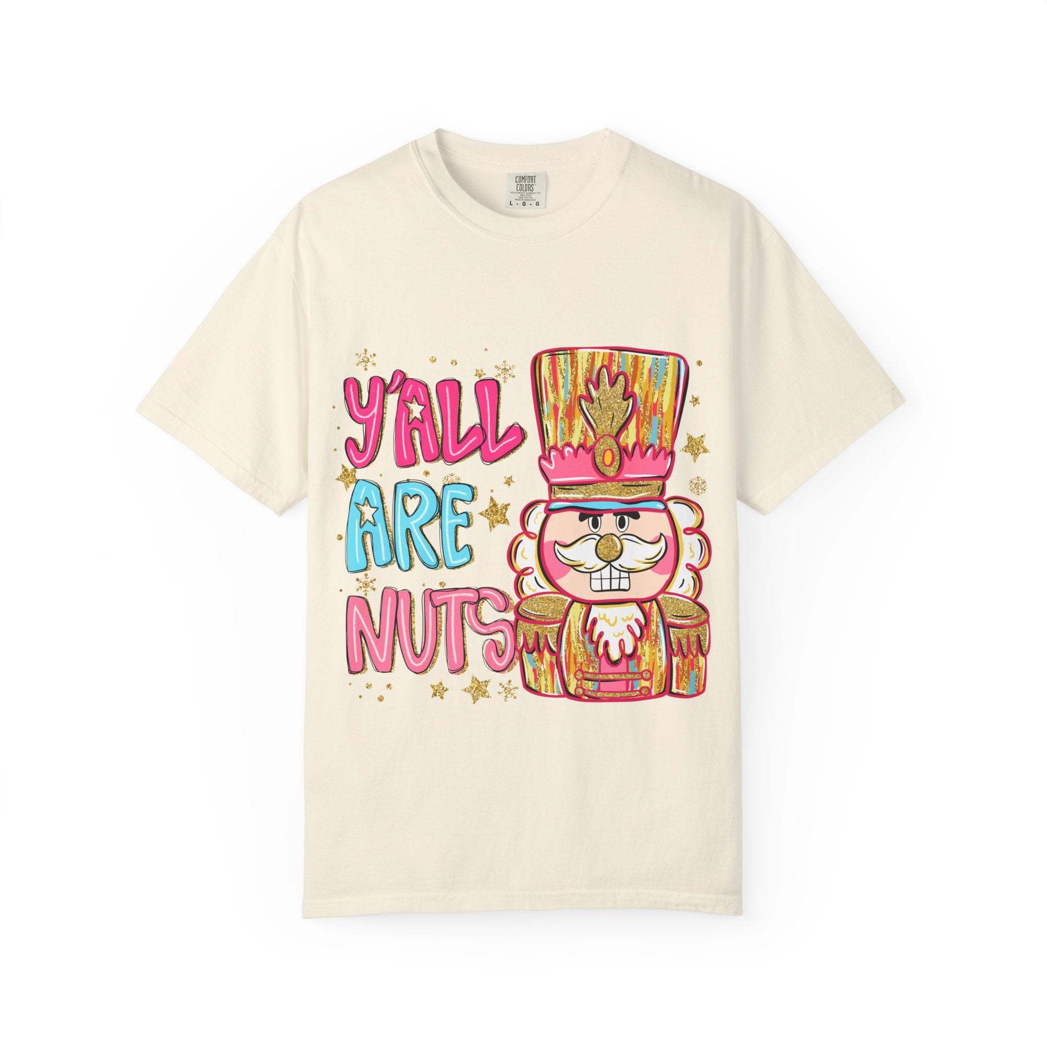 Cream T-shirt with colorful Yall Are Nuts Nutcracker graphic and festive design