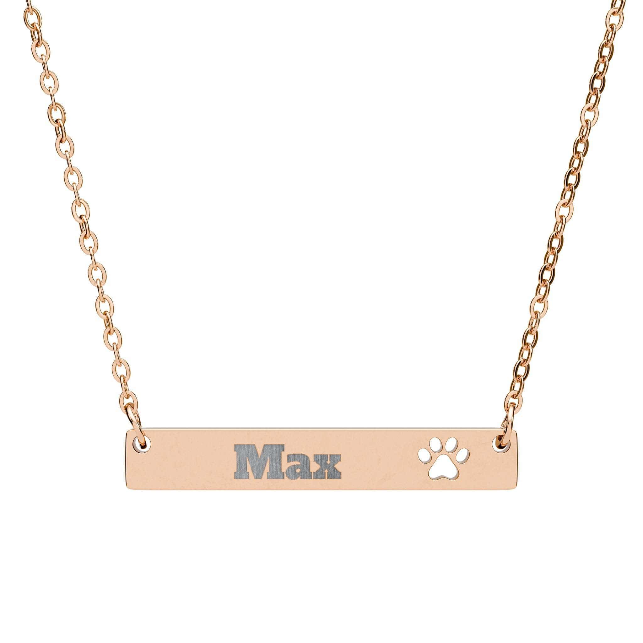 Rose gold necklace with 'Max' and a paw print on a white background