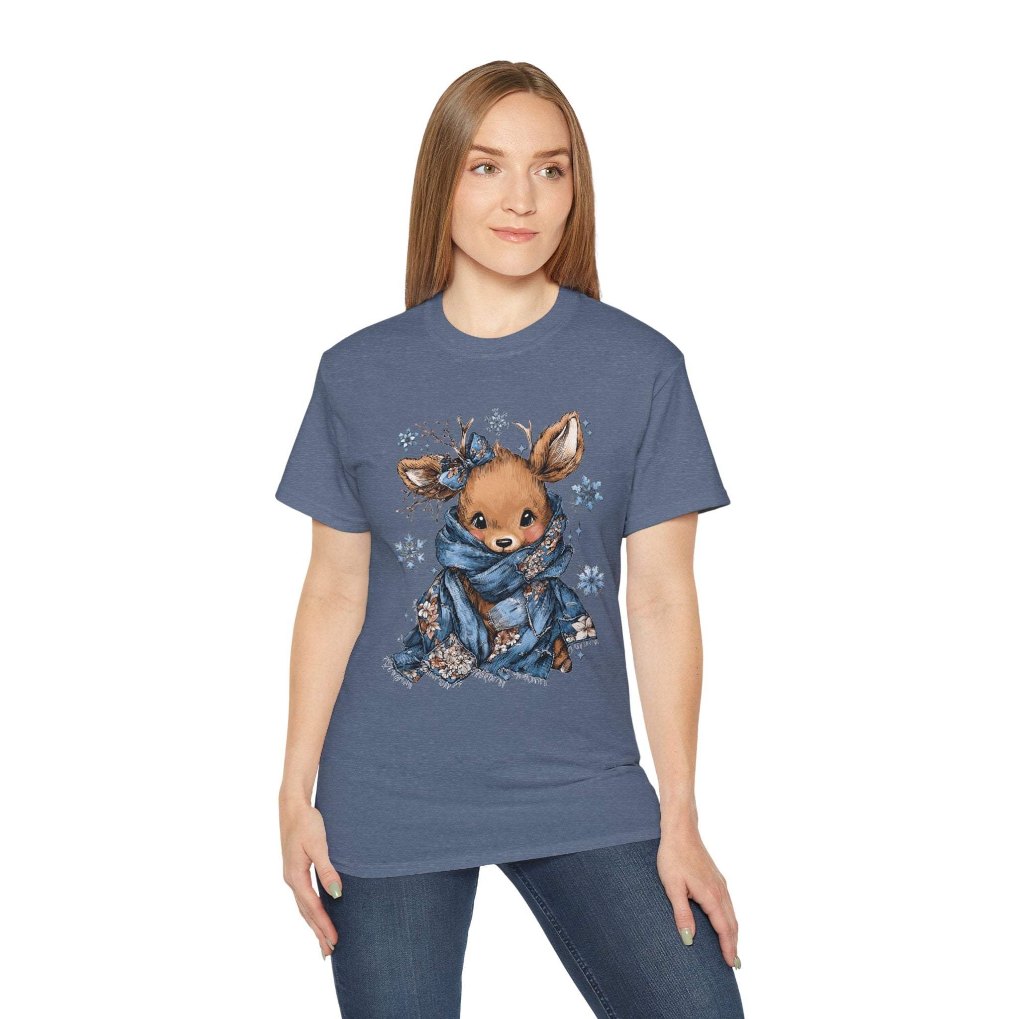 Woman wearing a Retro Patchwork Reindeer blue t-shirt with festive reindeer graphic and snowflakes