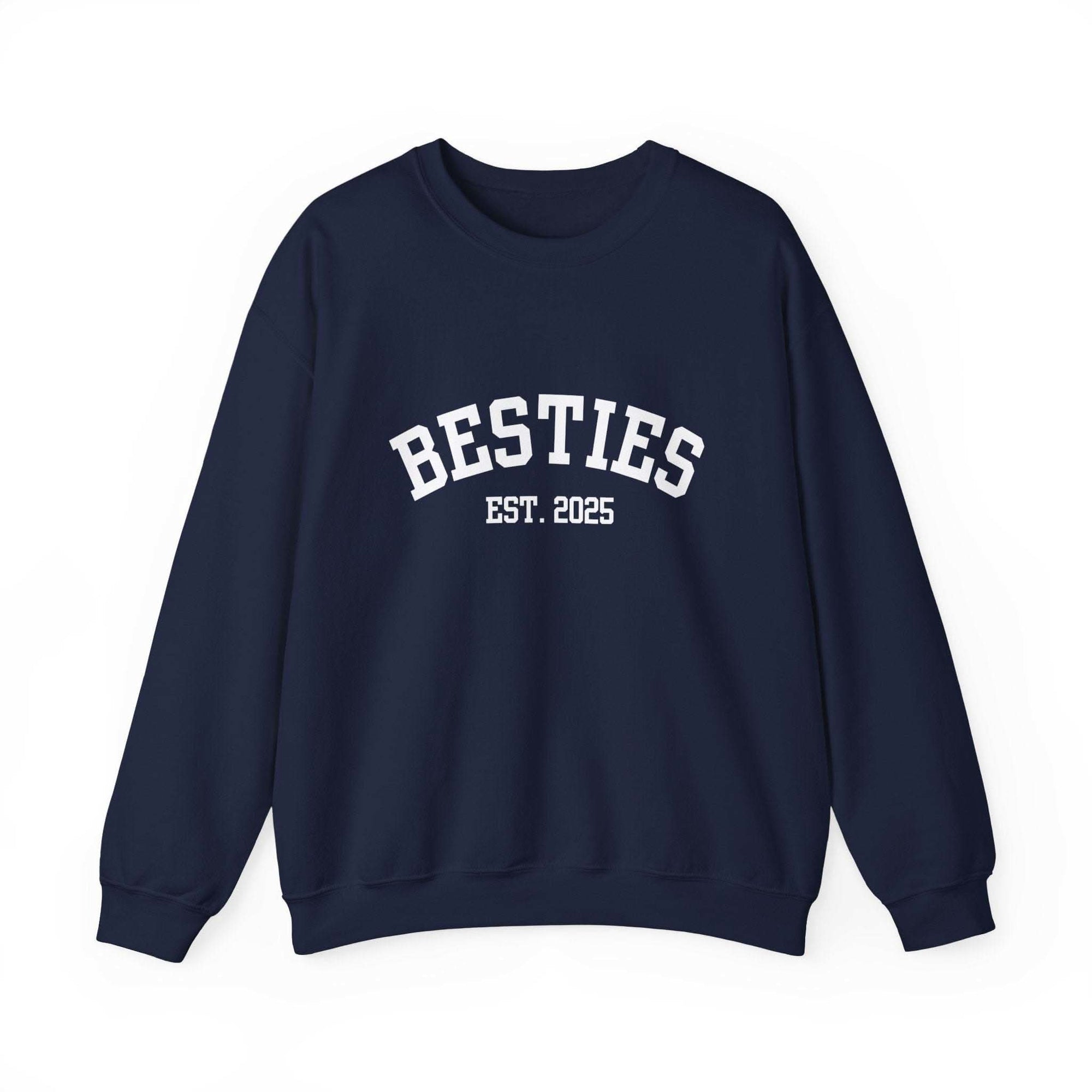 Navy blue sweatshirt with 'BESTIES EST. 2025' text on a white background