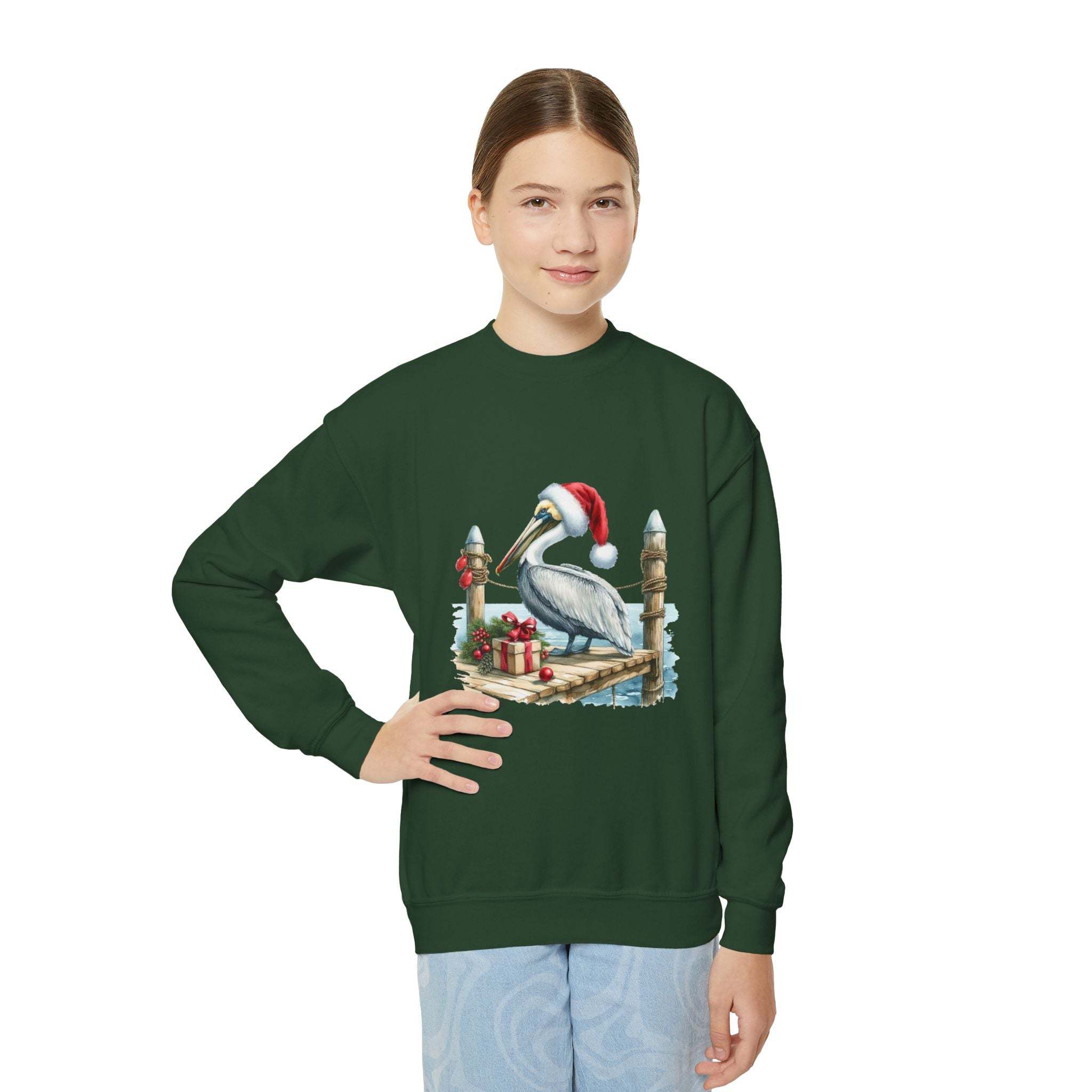 Youth wearing green Pelican Santa Hat crewneck sweatshirt with embroidered pelican and holiday gifts design