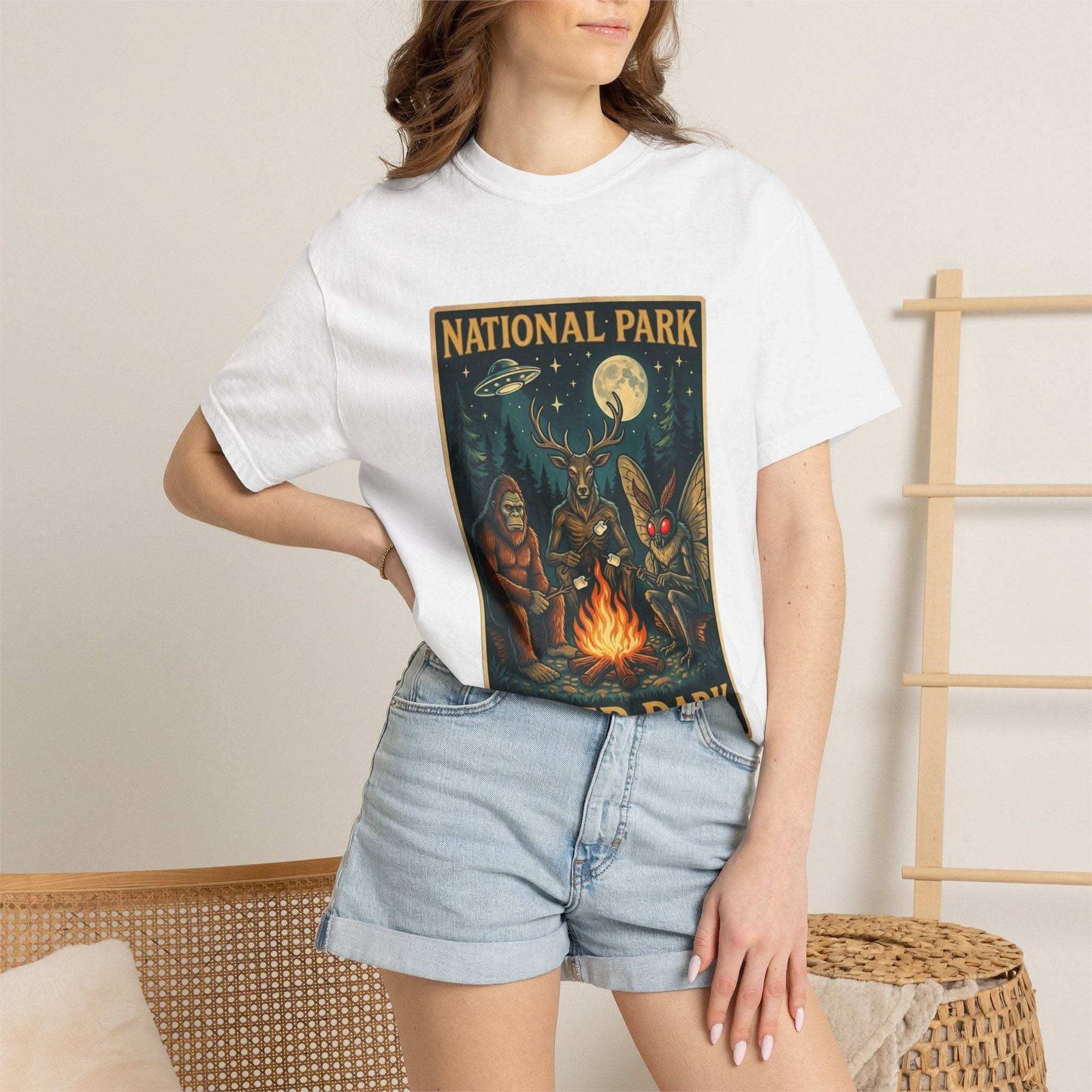 Vintage National Park After Dark t-shirt with campfire, Sasquatch, Mothman, and nocturnal creatures design