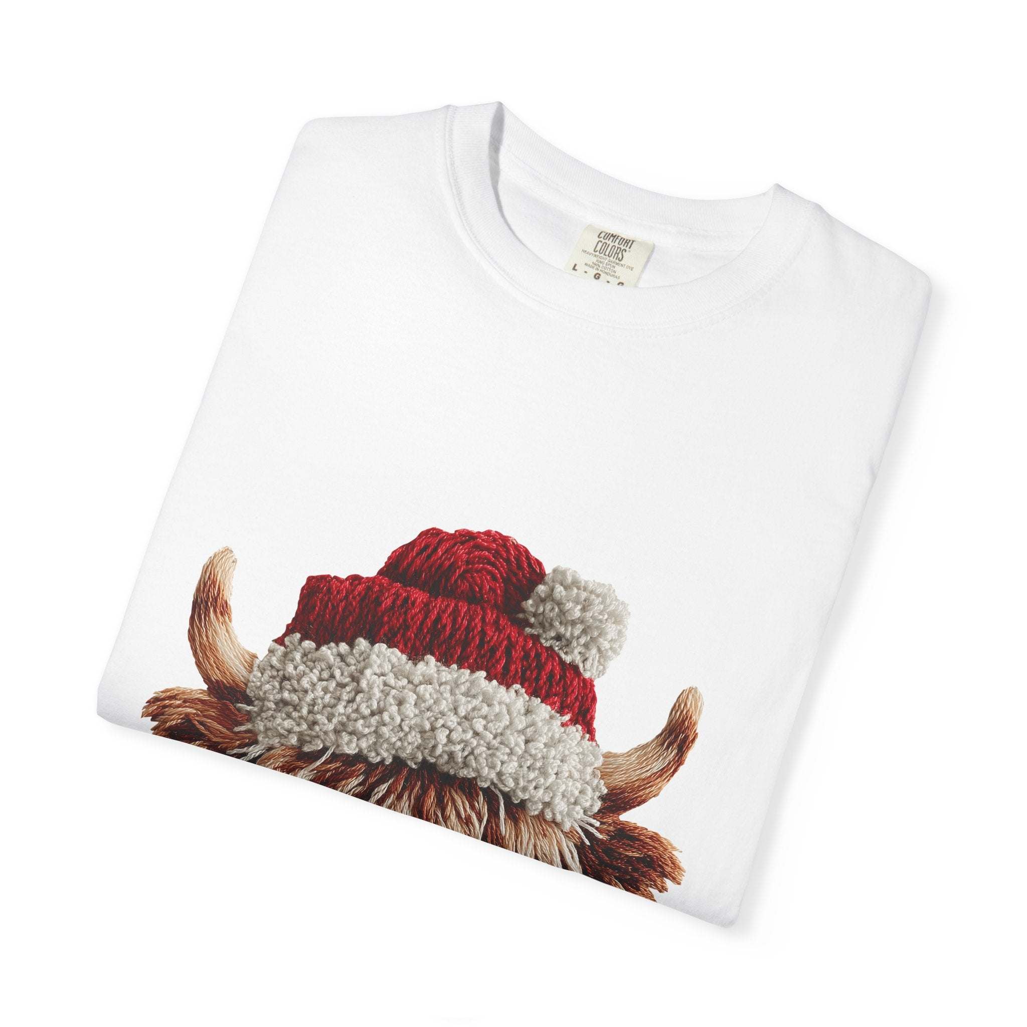 White T-shirt with faux crochet yarn highland cow wearing Santa hat print