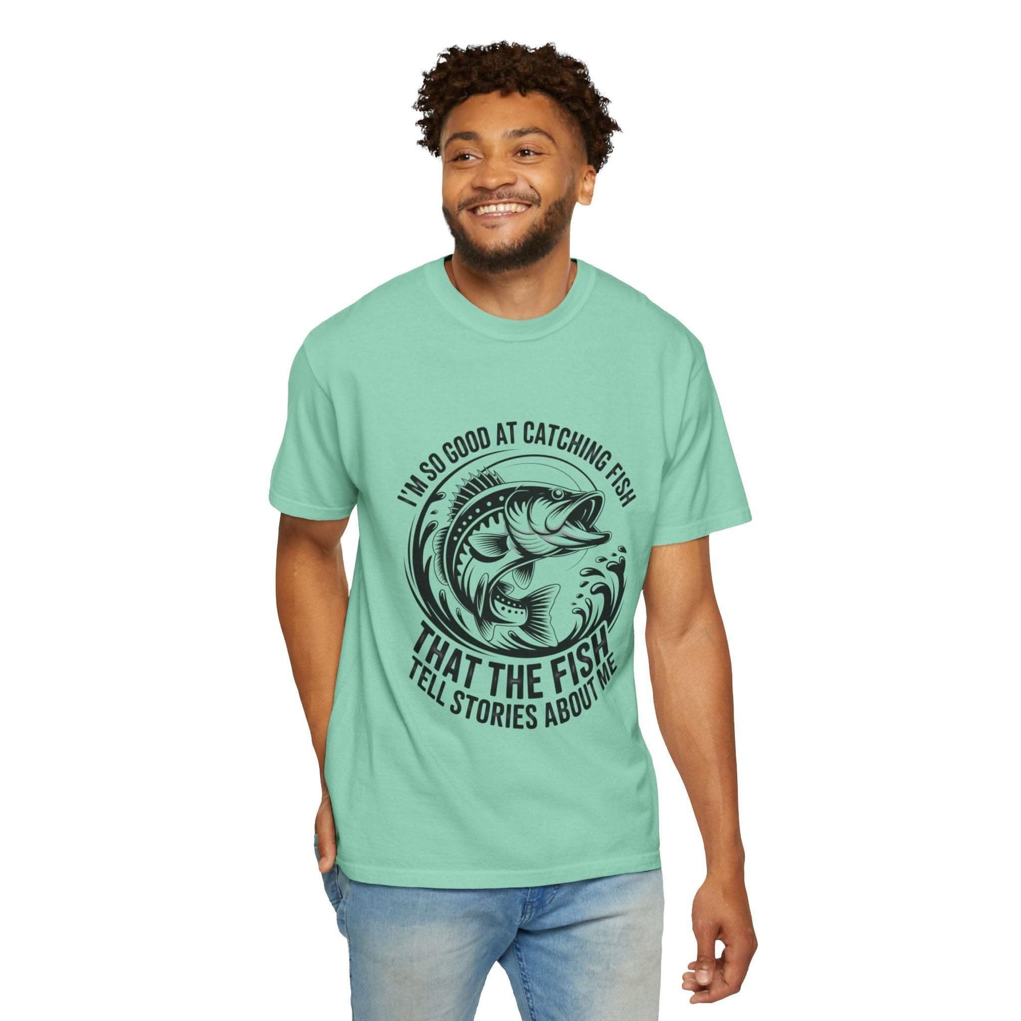 Fishing T-Shirt with “So Good At Catching Fish That The Fish Tell Stories About Me” slogan on relaxed-fit cotton tee