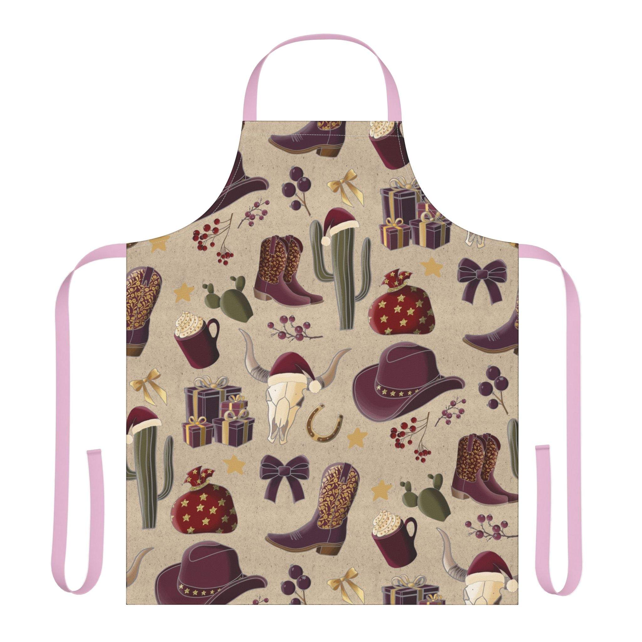 Cowboy Christmas apron with festive western holiday design and pink tie-back straps