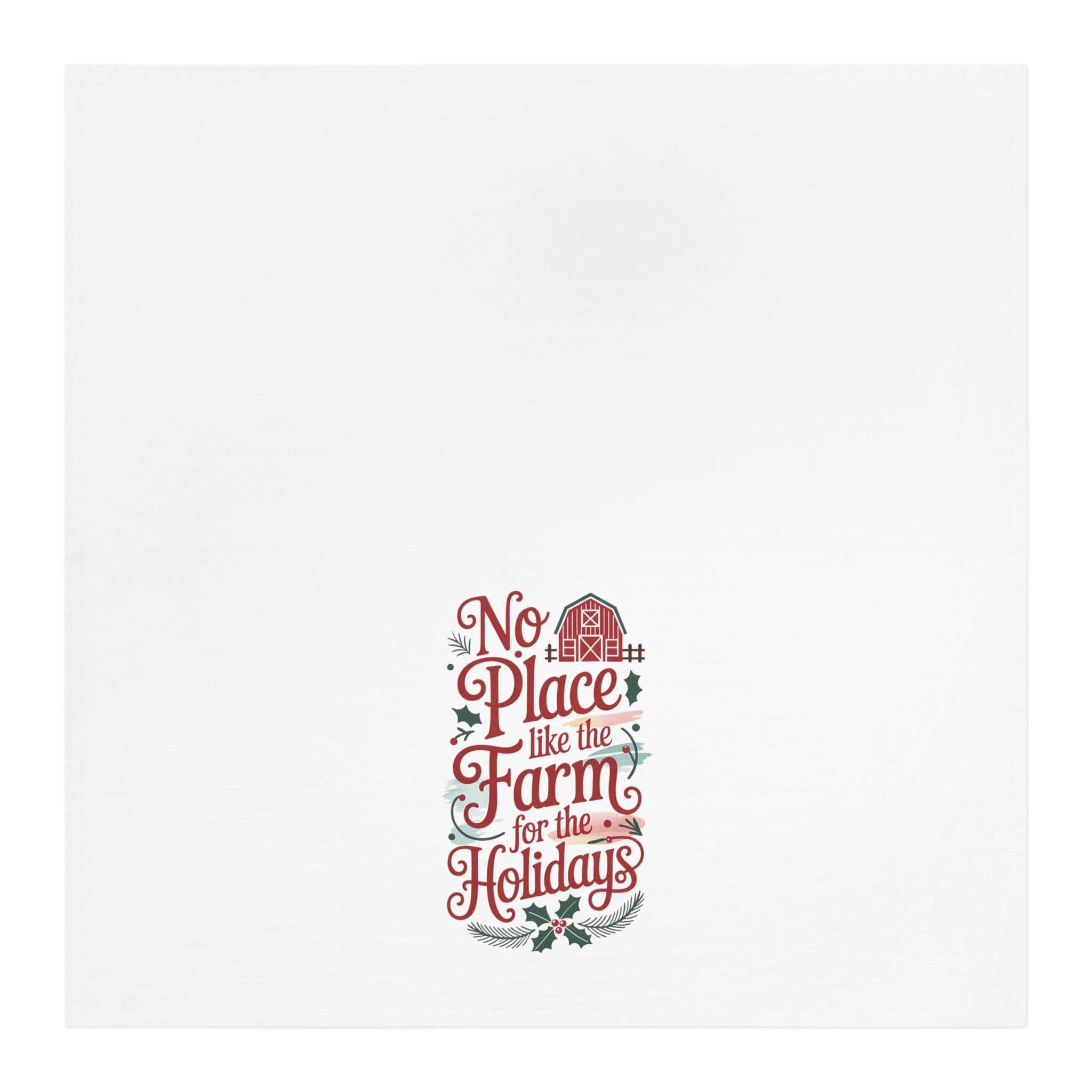 White cotton farm tea towel with "No place like the farm for the holidays" festive design
