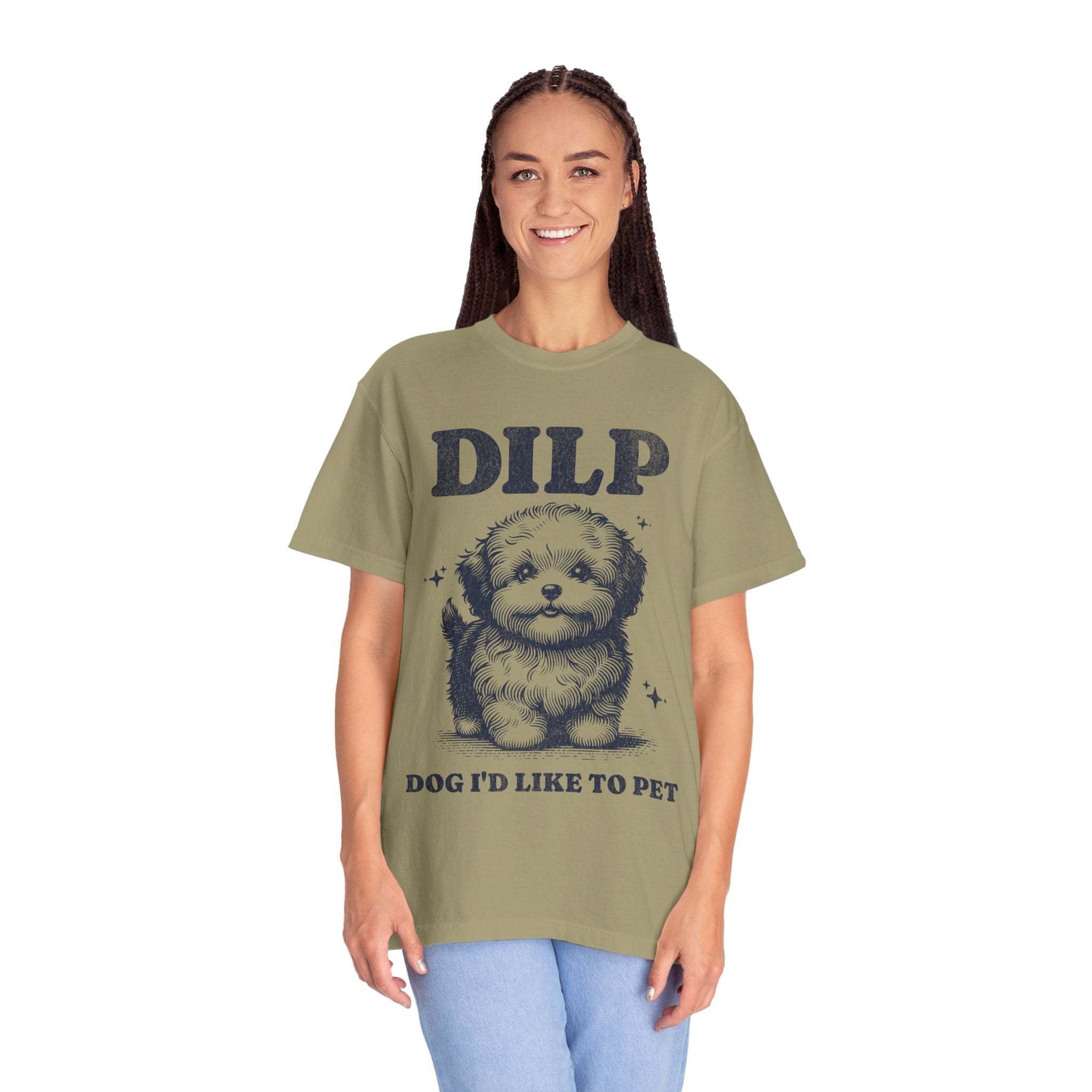 Garment-dyed T-shirt with playful dog graphic and DILP Dog I'd Like To Pet text, worn by smiling woman