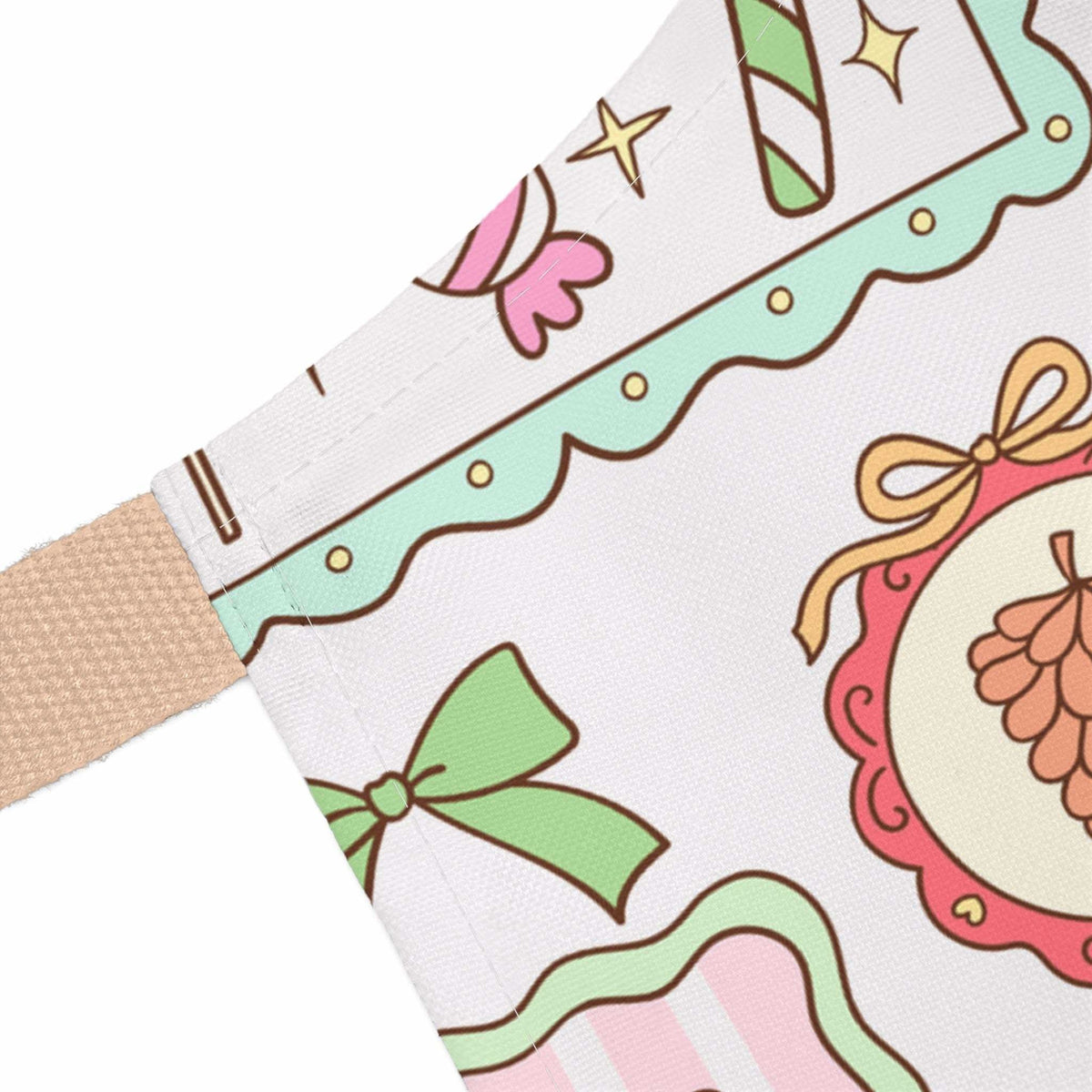 Close-up of Retro Christmas Frames and Bows apron with festive holiday design and beige strap