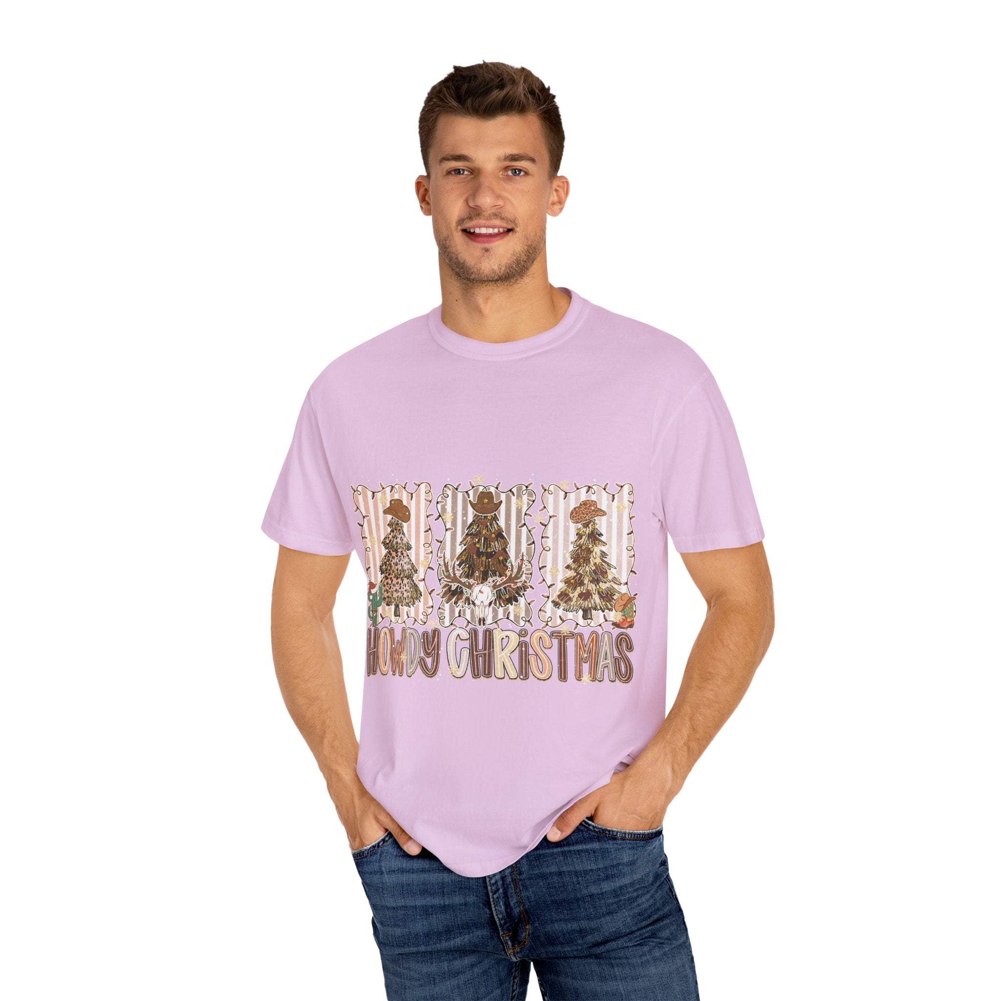 Man wearing pink Cowboy Howdy Christmas t-shirt with festive cowboy-themed design