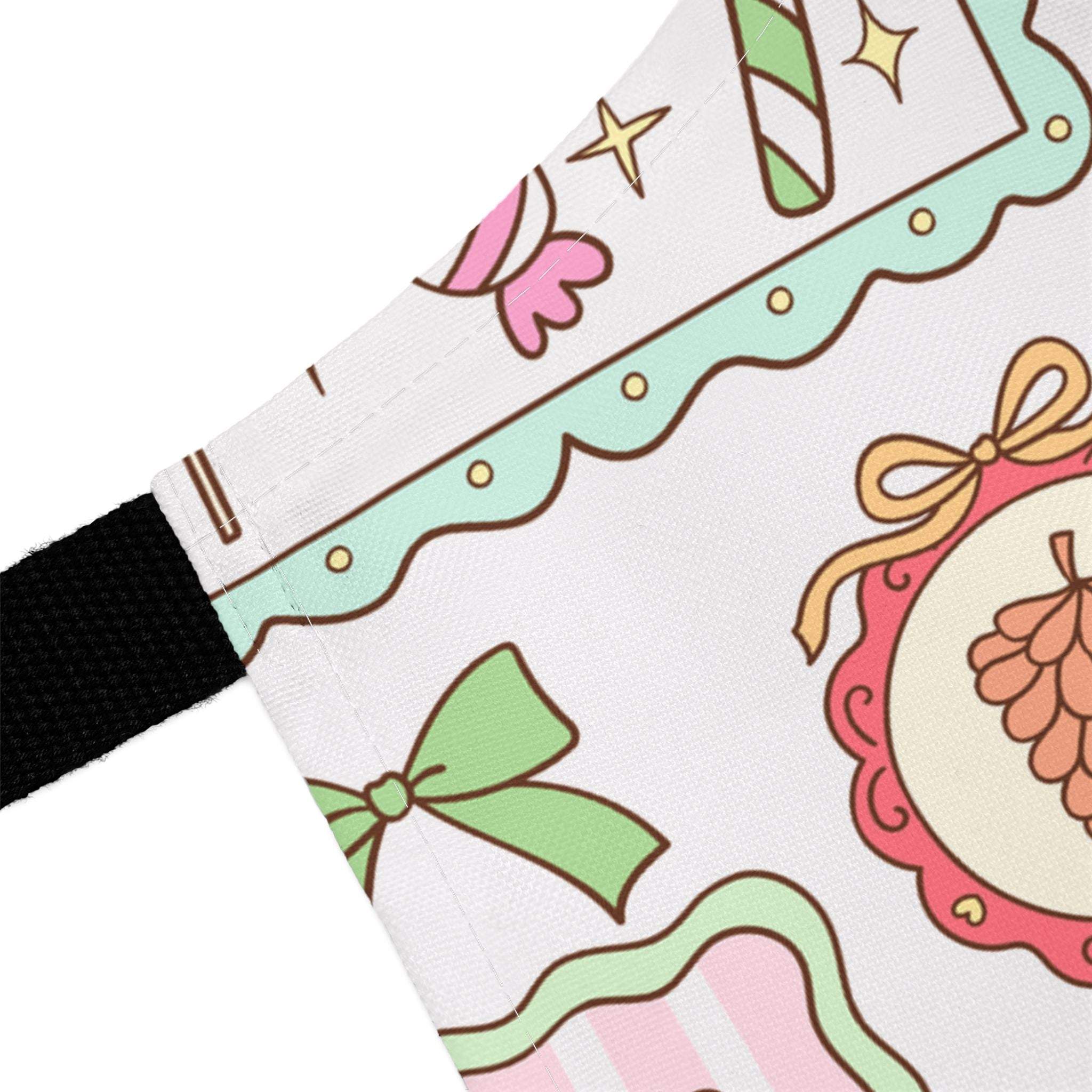 Close-up of Retro Christmas Frames and Bows apron with festive bow and candy cane design on polyester fabric