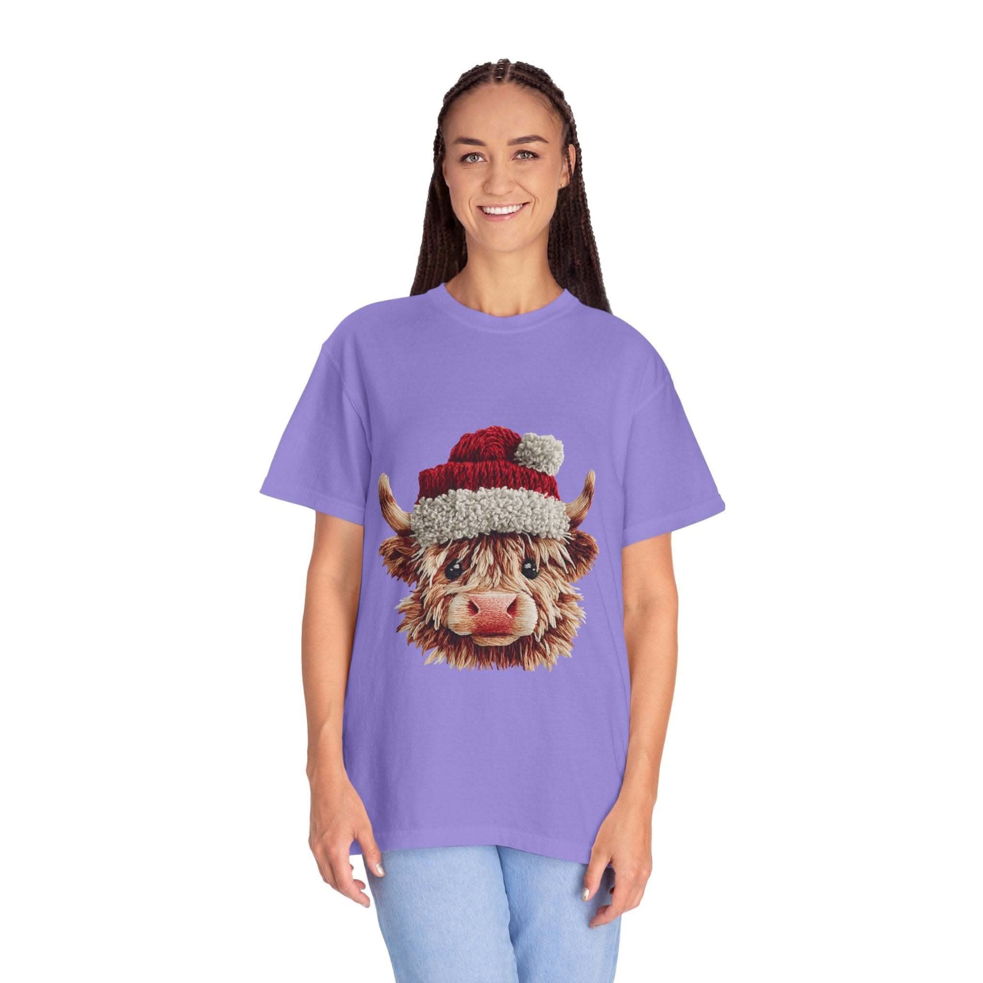 Black t-shirt featuring faux crochet yarn Highland cow Santa print by Printify, perfect for cozy Christmas wear.