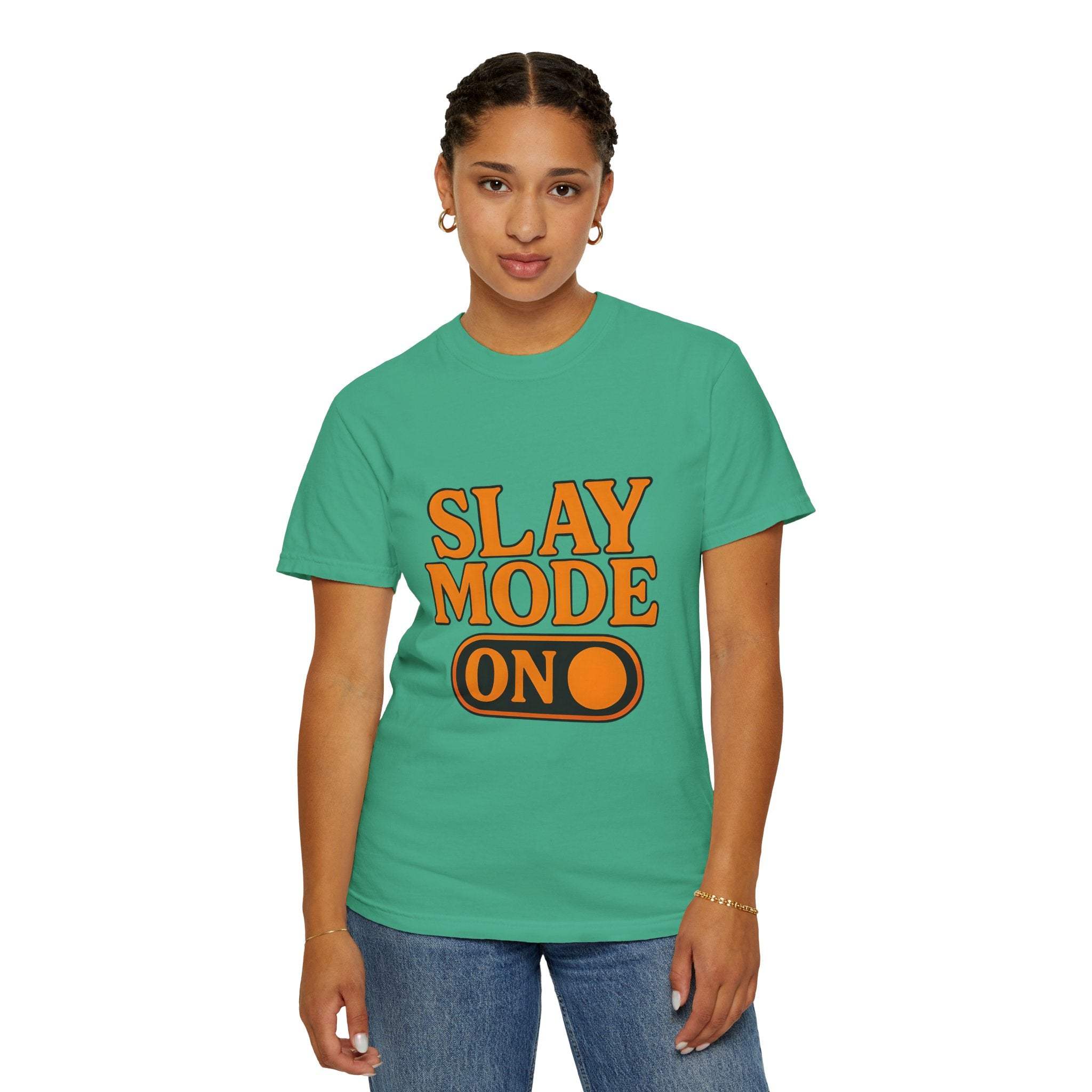 Woman wearing green garment-dyed tee with "Slay Mode On" text, casual cotton shirt for empowerment and comfort