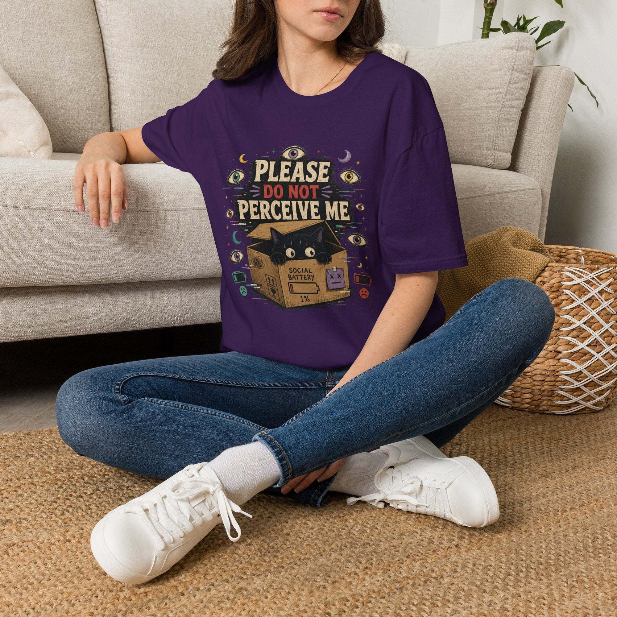 Surreal black cat in box t-shirt with "Please Do Not Perceive Me" weirdcore graphic and occult eyes design