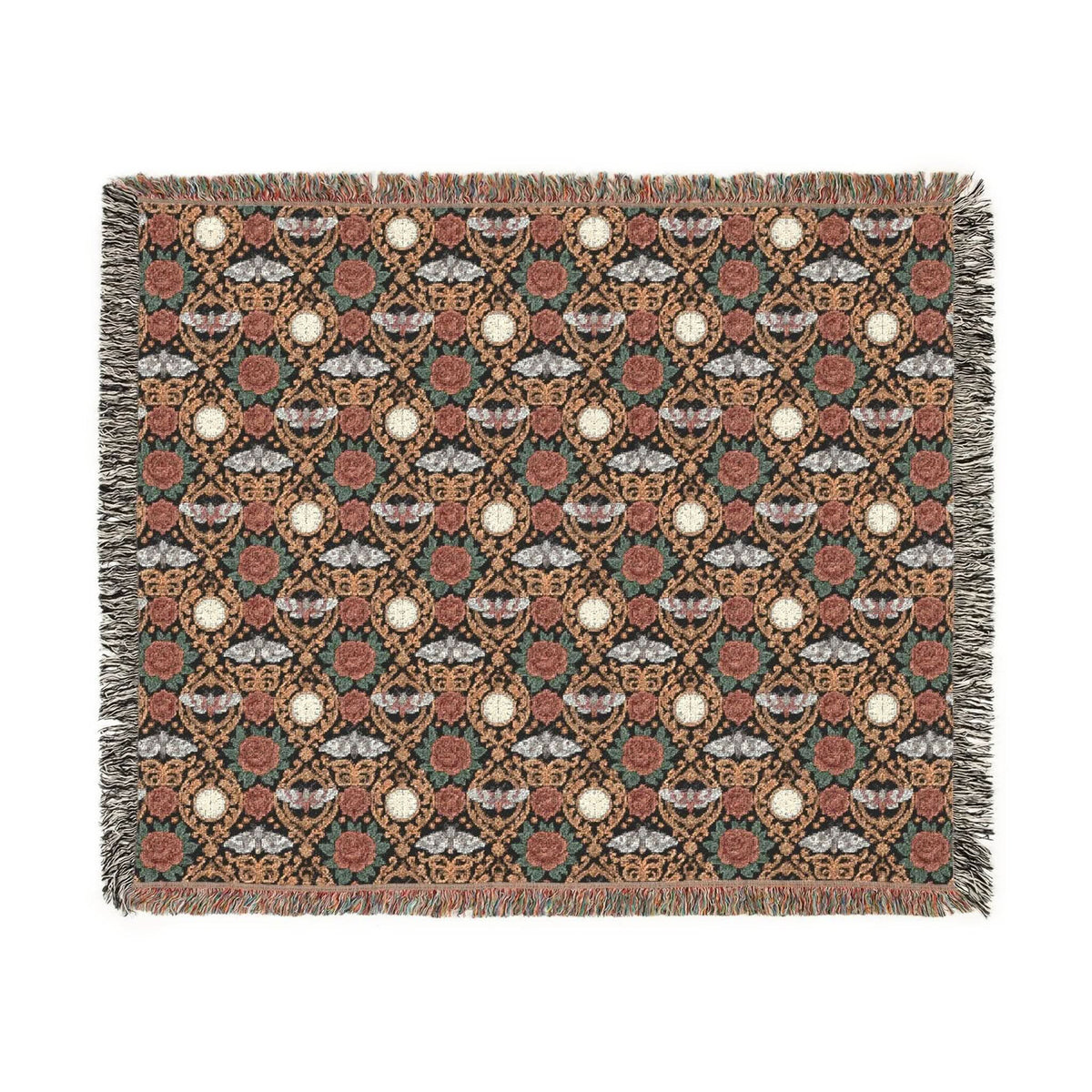 Victorian Gothmas Woven Blanket with candlelight-inspired colors and colorful fringed edges on a dark velvet background