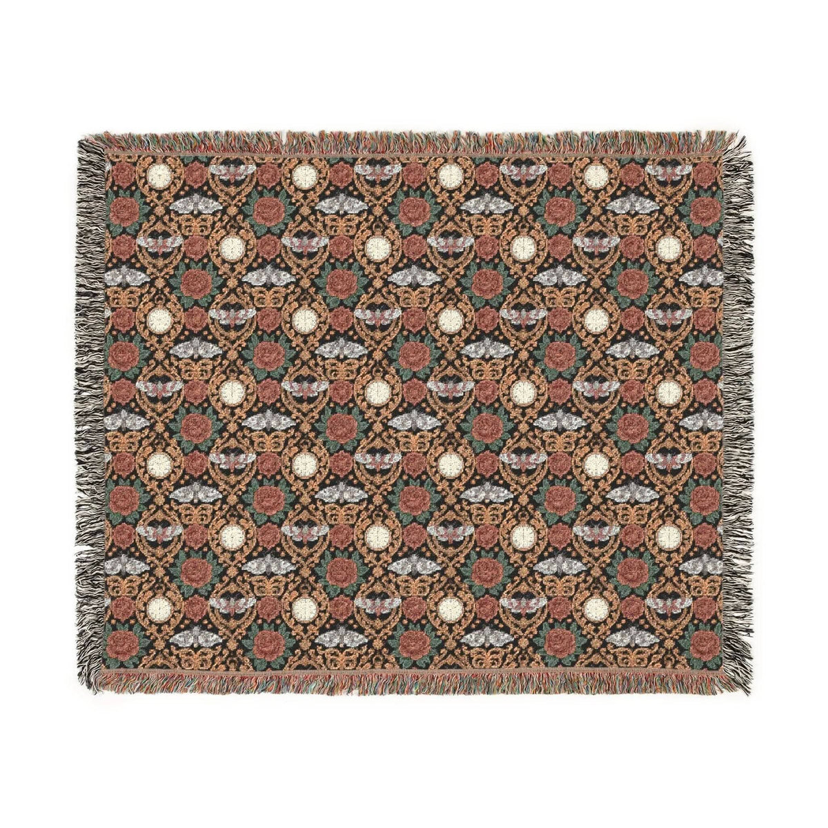 Victorian Gothmas Woven Blanket with candlelight-inspired colors and colorful fringed edges on a dark velvet background