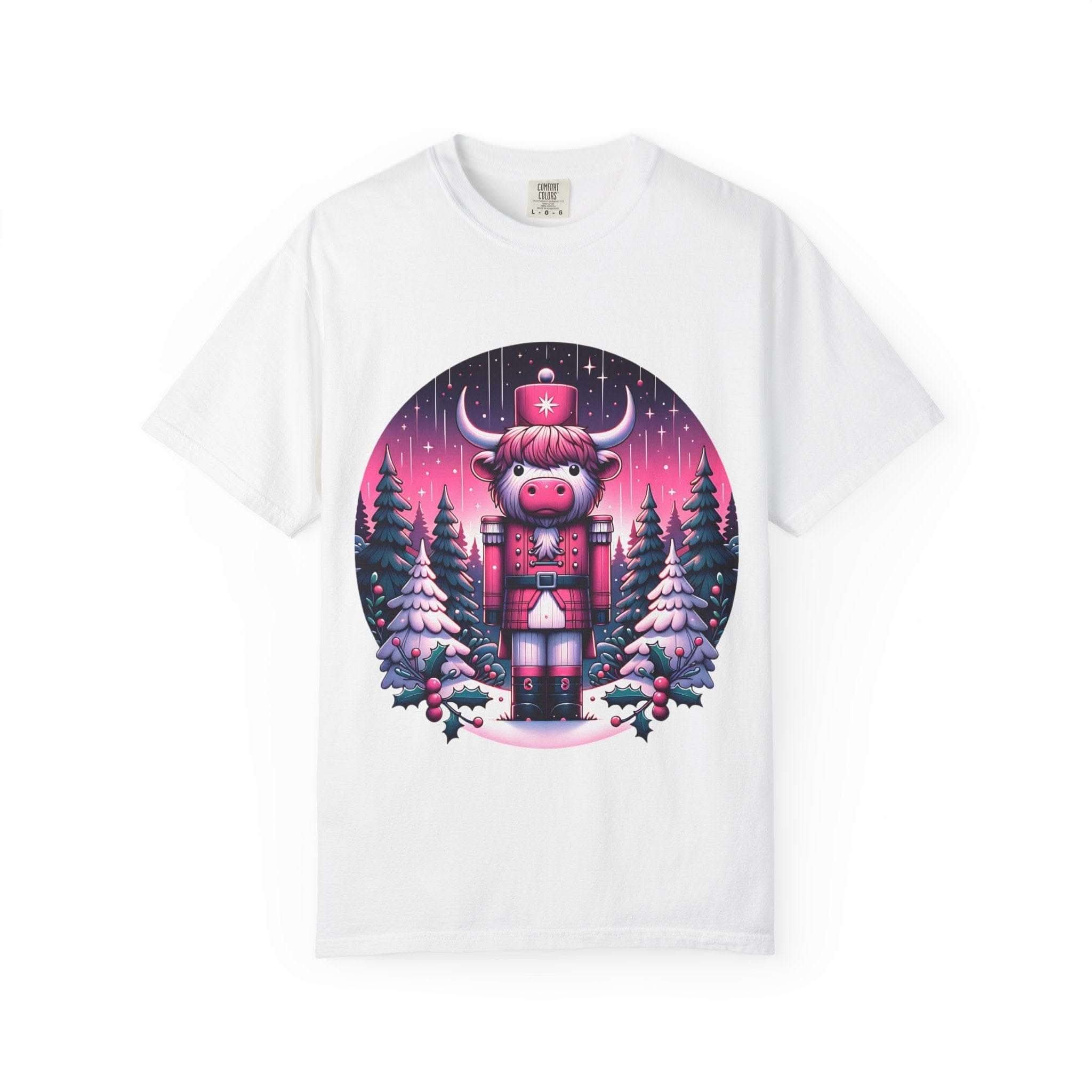 White Cow Nutcracker T-shirt with festive Highland cow nutcracker design and snowy pine trees background