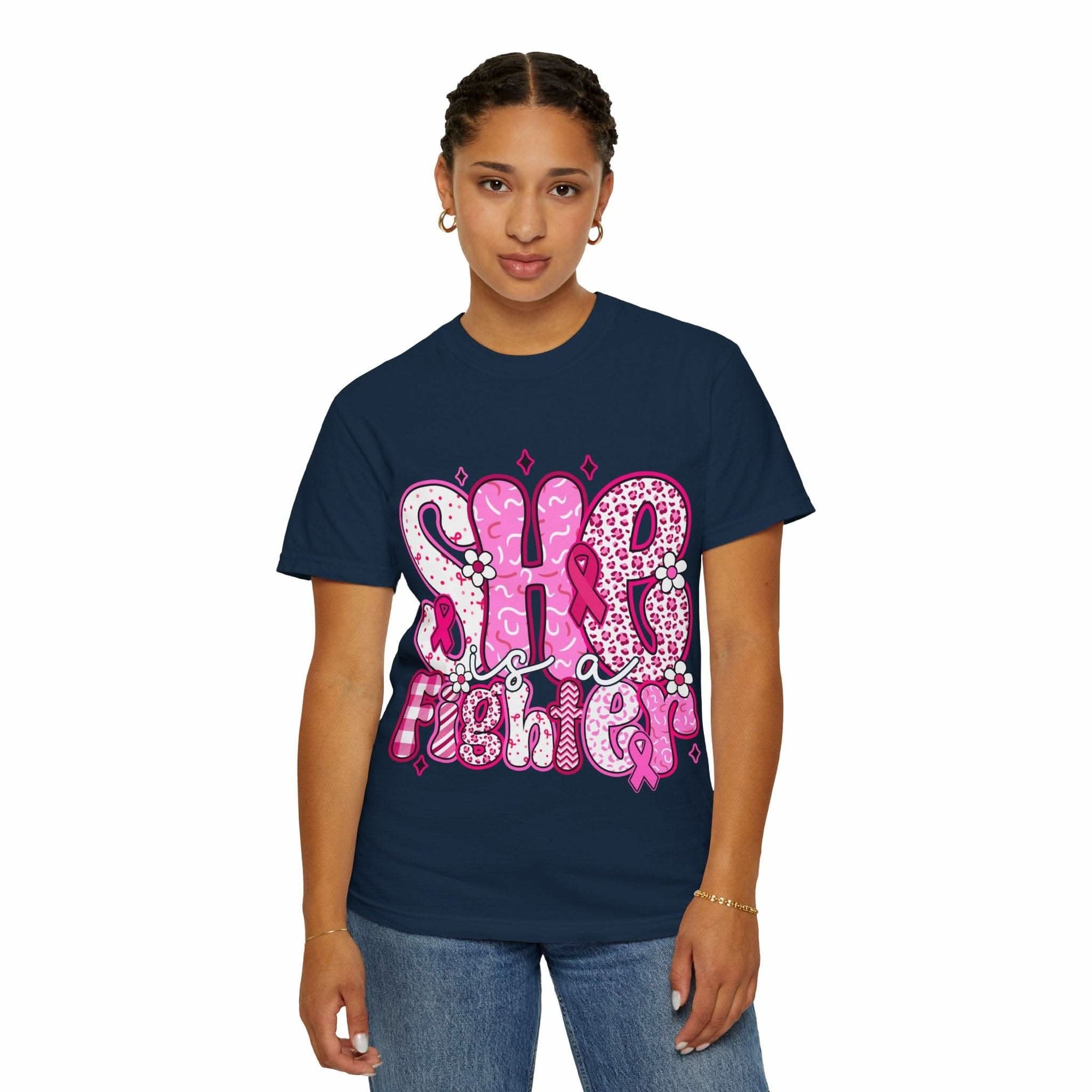 woman wearing navy Fighter Breast Cancer T-shirt with pink graphic text design