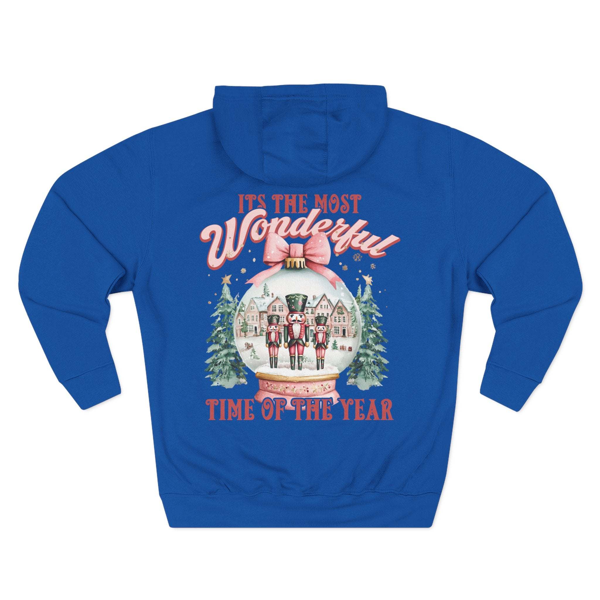 Blue fleece hoodie with vintage pink snow globe and nutcracker design for festive winter comfort