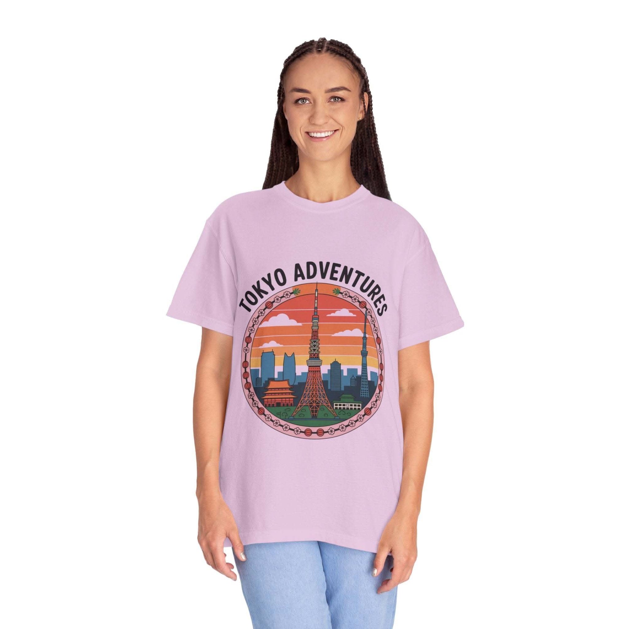 Woman wearing purple garment-dyed T-shirt with Tokyo Adventures graphic and skyline design
