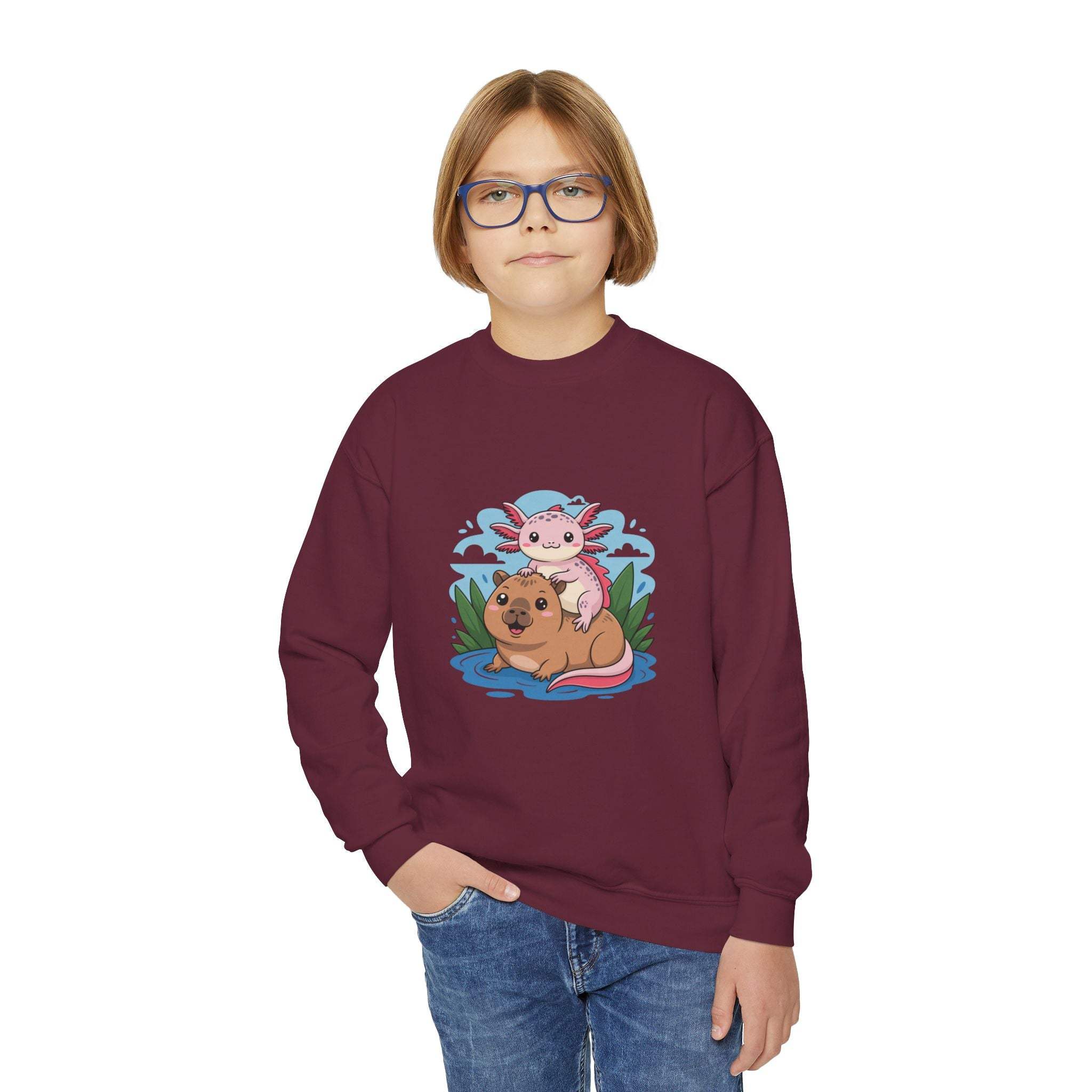Child wearing a maroon sweatshirt with a cartoon design on a white background