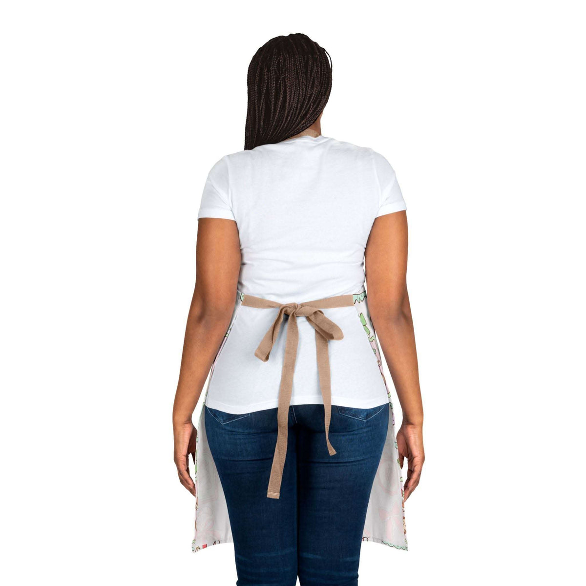 Woman wearing Retro Christmas Frames apron with beige tie-back straps viewed from the back