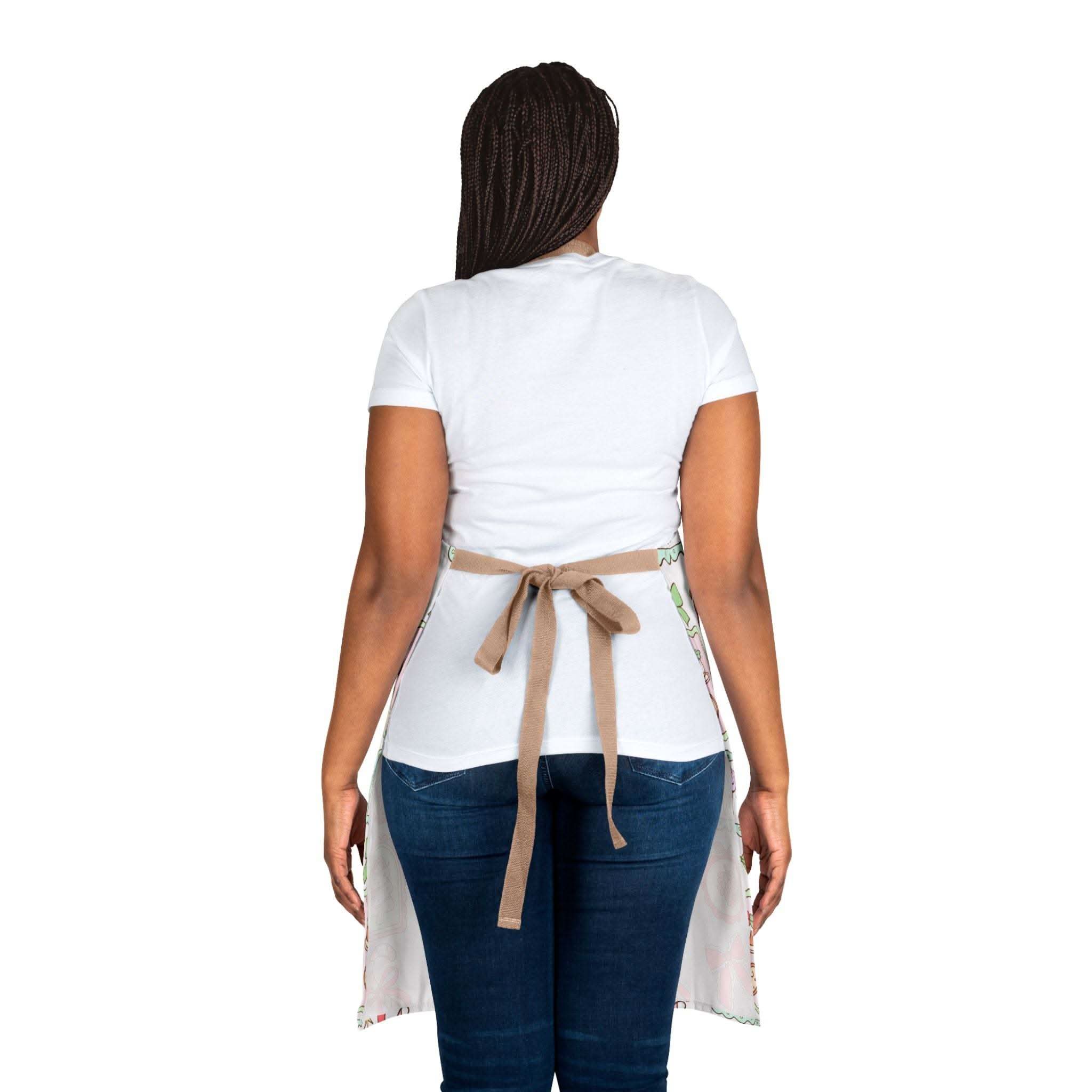 Woman wearing Retro Christmas Frames apron with beige tie-back straps viewed from the back