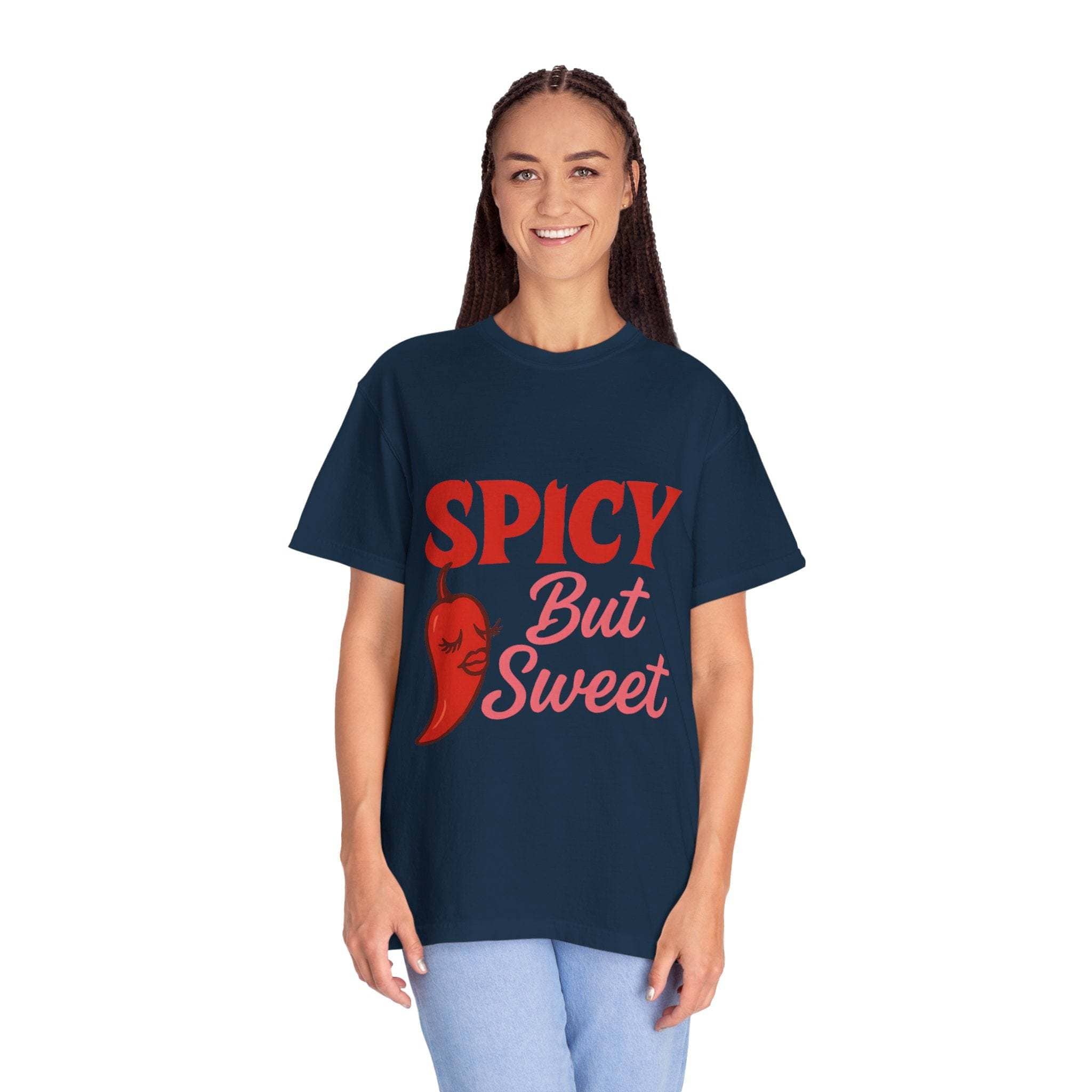 Spicy But Sweet T-shirt in navy blue with red text and chili pepper graphic worn by smiling woman