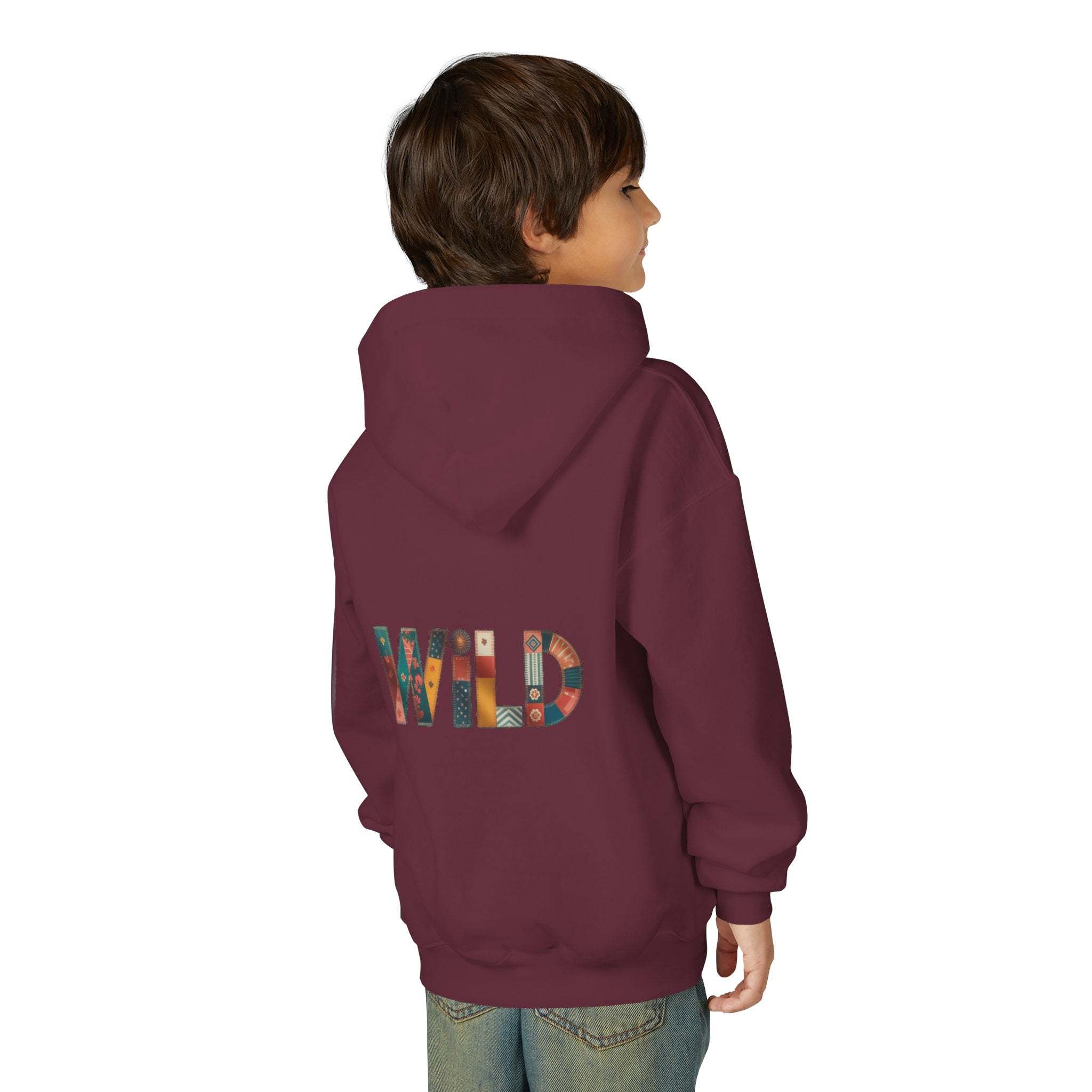 Child wearing maroon Patchwork Wild Word Hoodie with colorful "WILD" text on back and hood.