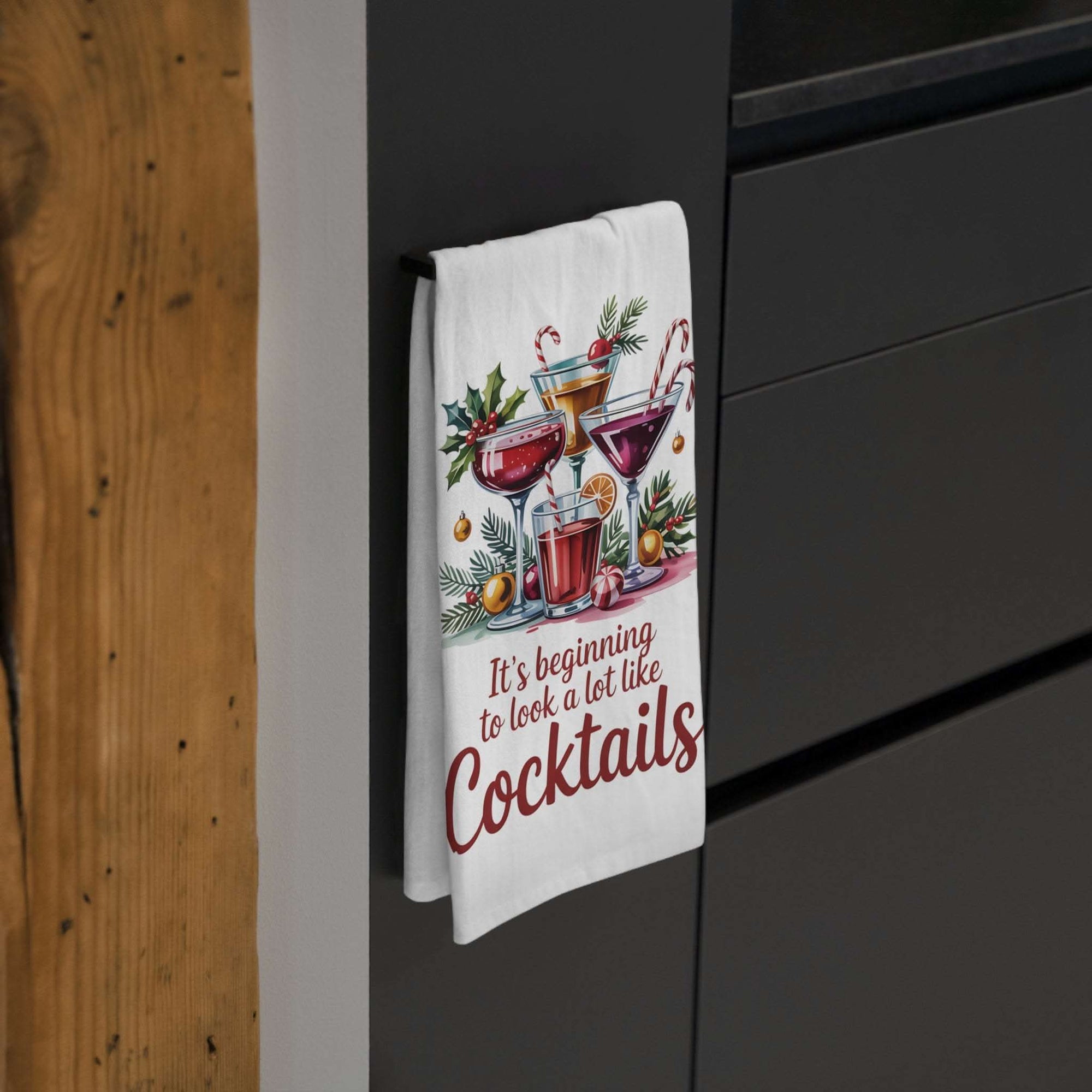 Festive tea towel with "It's Beginning to Look a Lot Like Cocktails" design for kitchen décor and holiday entertaining