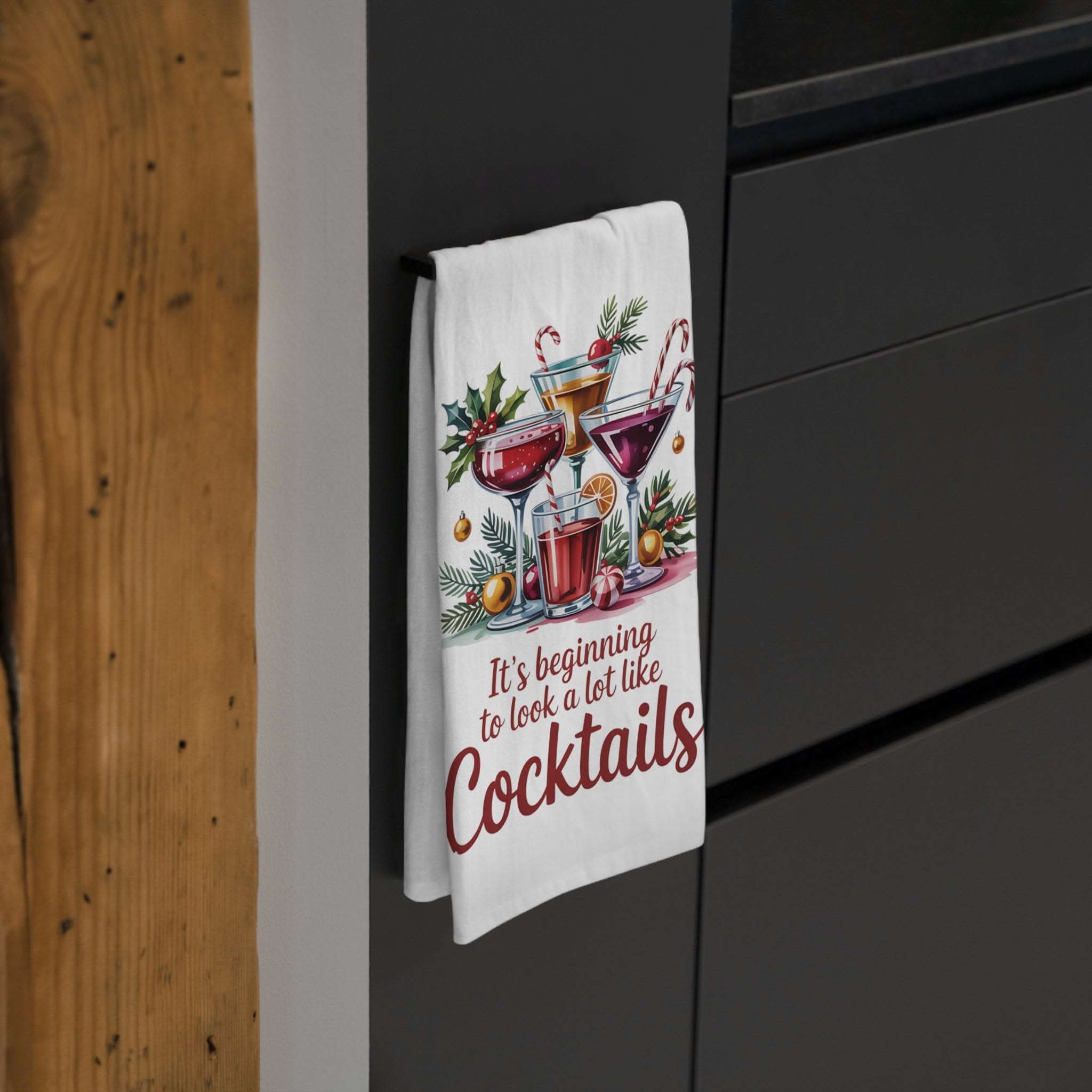 Festive tea towel with "It's Beginning to Look a Lot Like Cocktails" design for kitchen décor and holiday entertaining