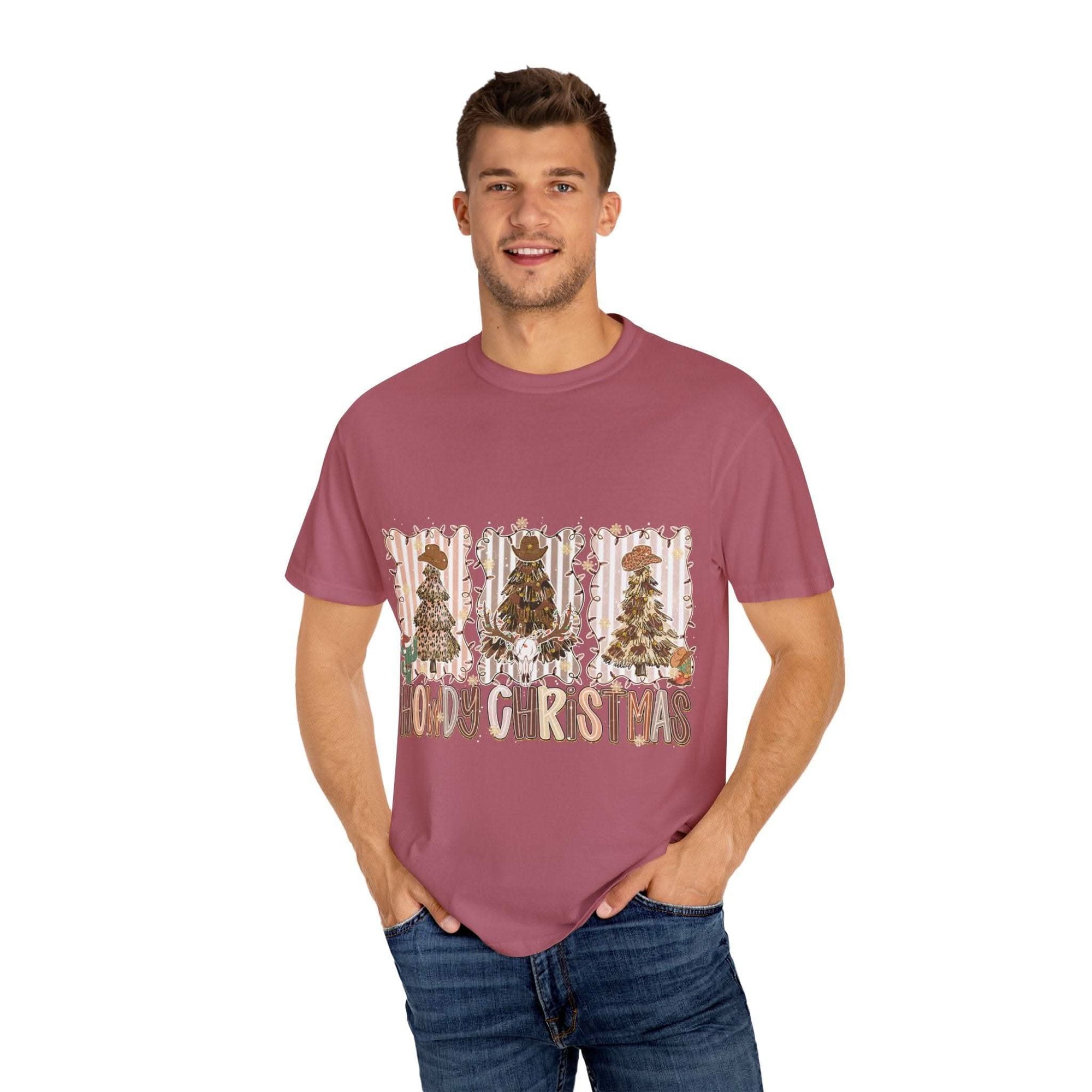 Man wearing maroon Cowboy Howdy Christmas t-shirt with festive holiday trees design
