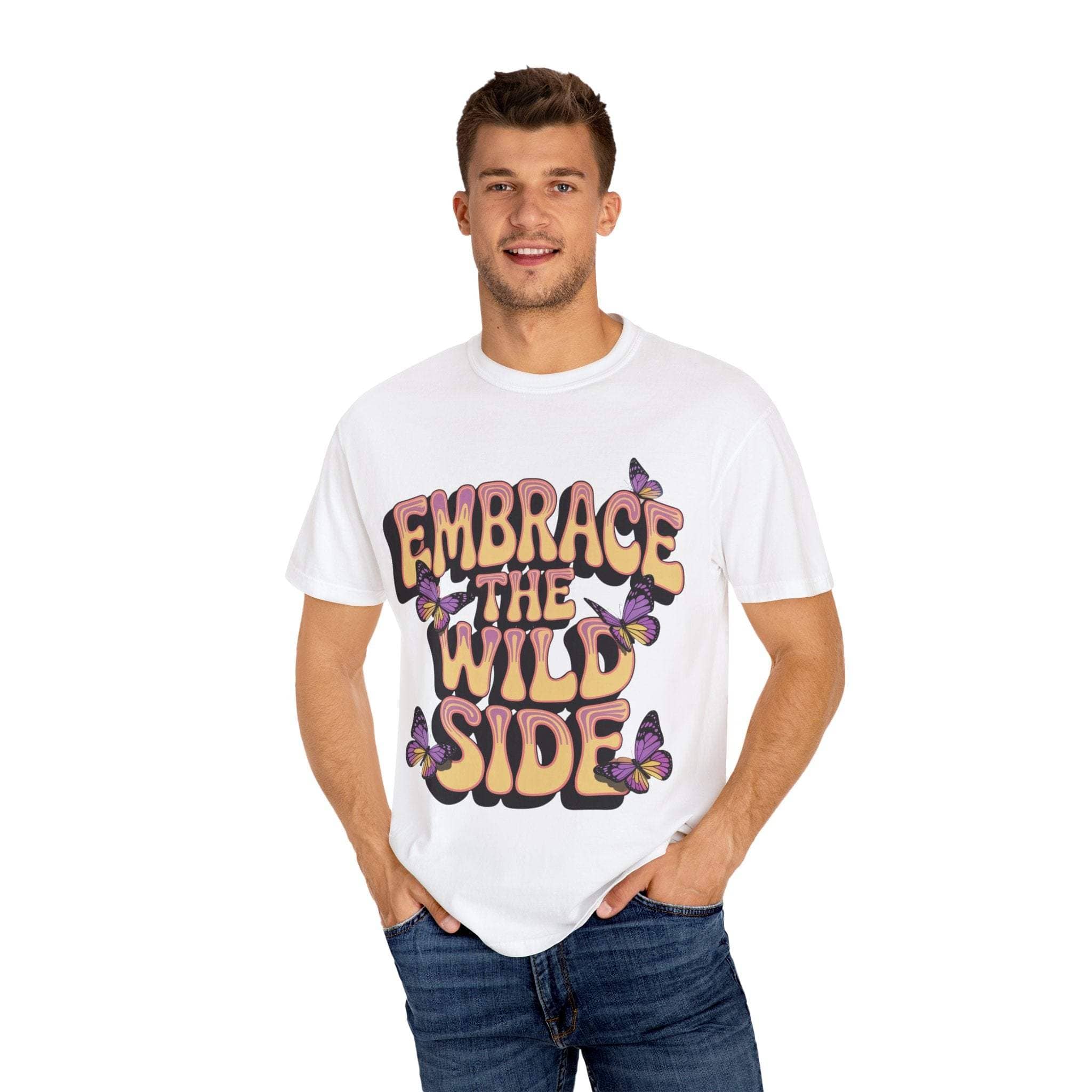 Garment-dyed white T-shirt with "Embrace the Wild Side" print and butterfly design worn by smiling man
